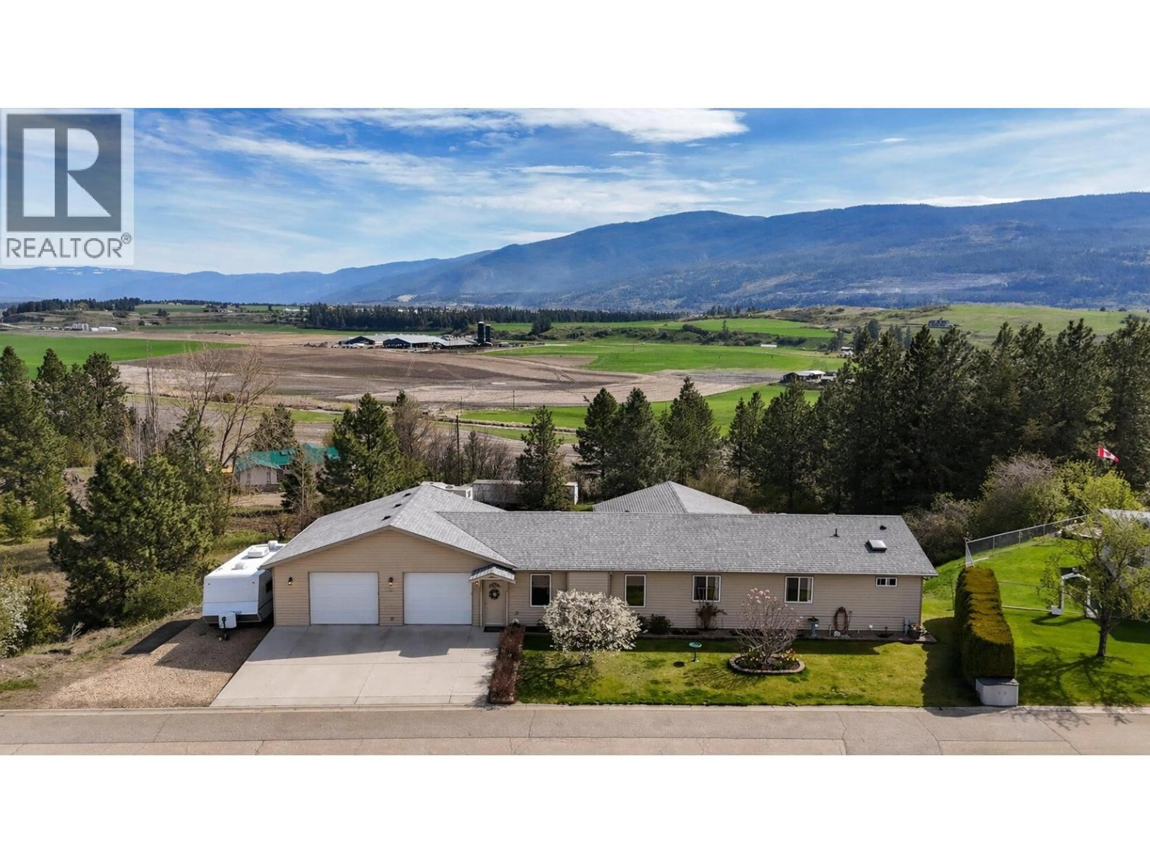 A pic from outside/outdoor area/front of a property/back of a property/a pic from drone, mountain view for 84 - 9510 97 HIGHWAY NORTH, Vernon British Columbia V1H1R8