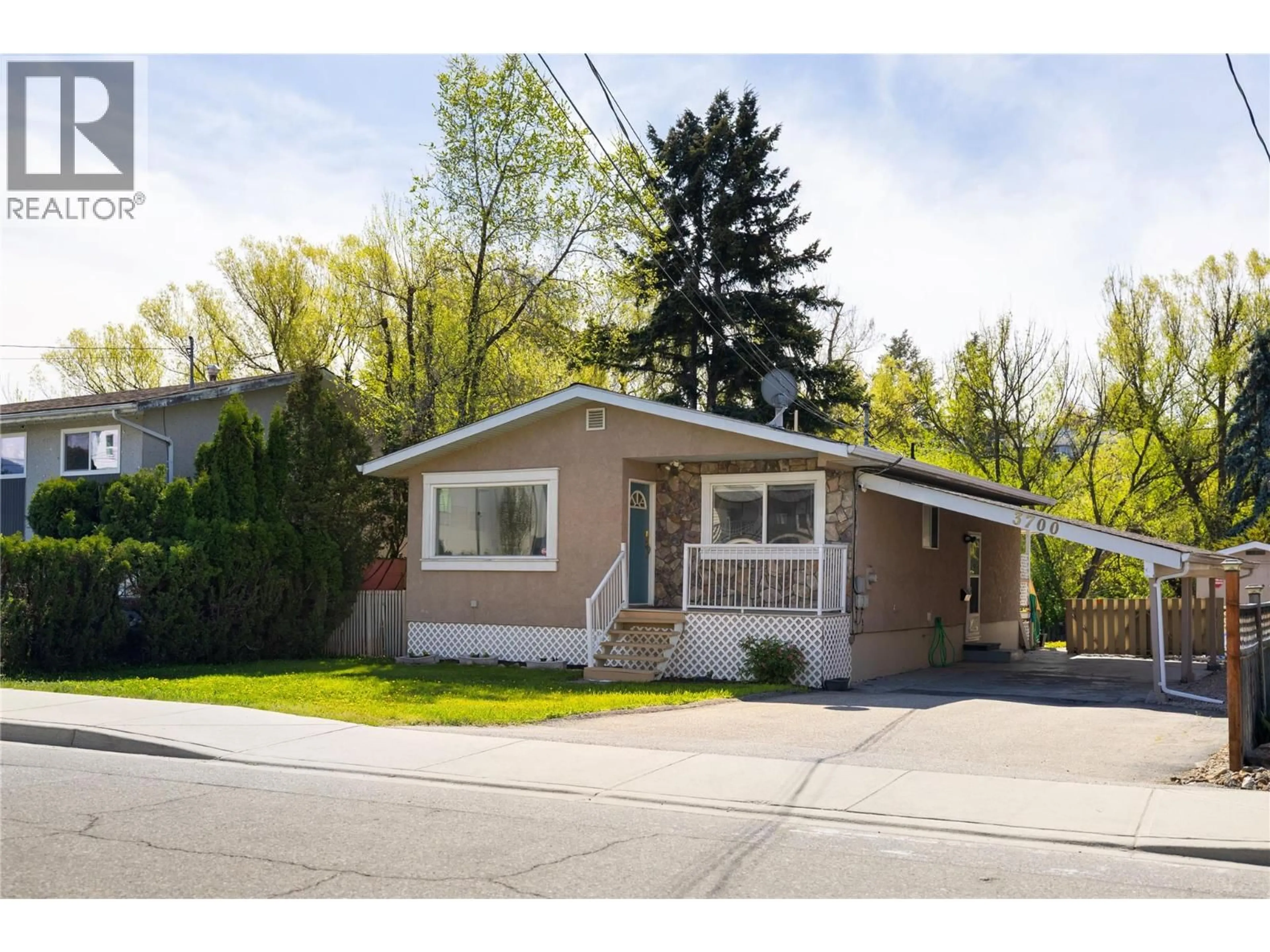 Home with vinyl exterior material, street for 3700 24 AVENUE, Vernon British Columbia V1T1L9