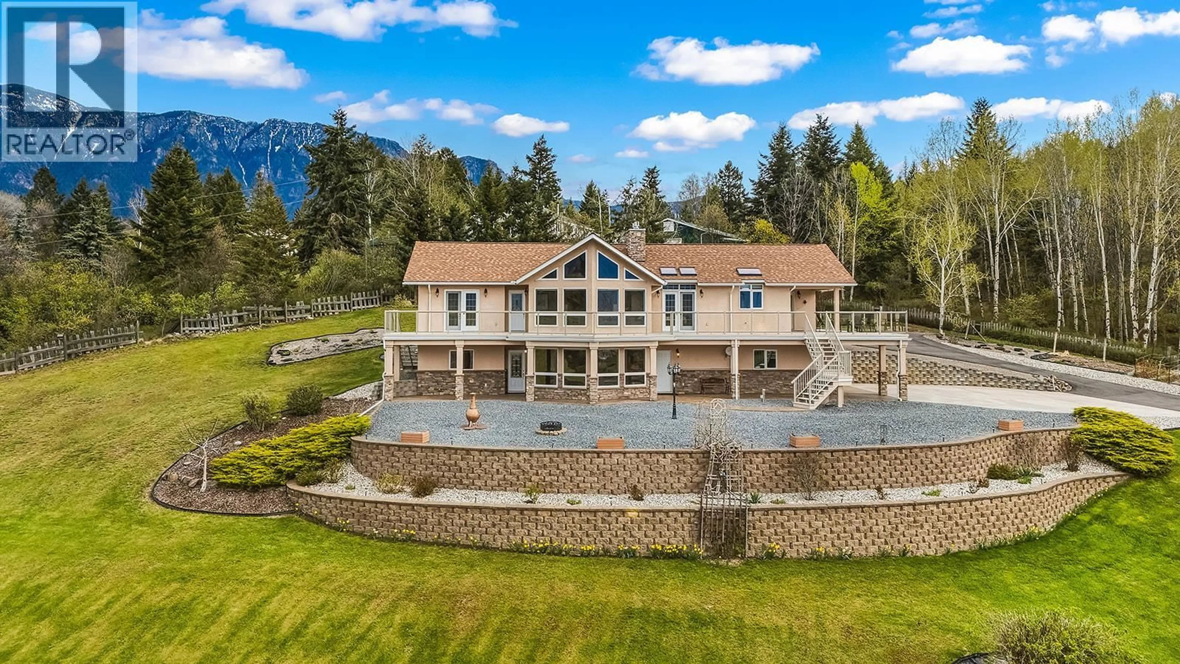 A pic from outside/outdoor area/front of a property/back of a property/a pic from drone, mountain view for 2489 38TH STREET, Canyon British Columbia V0B1G2