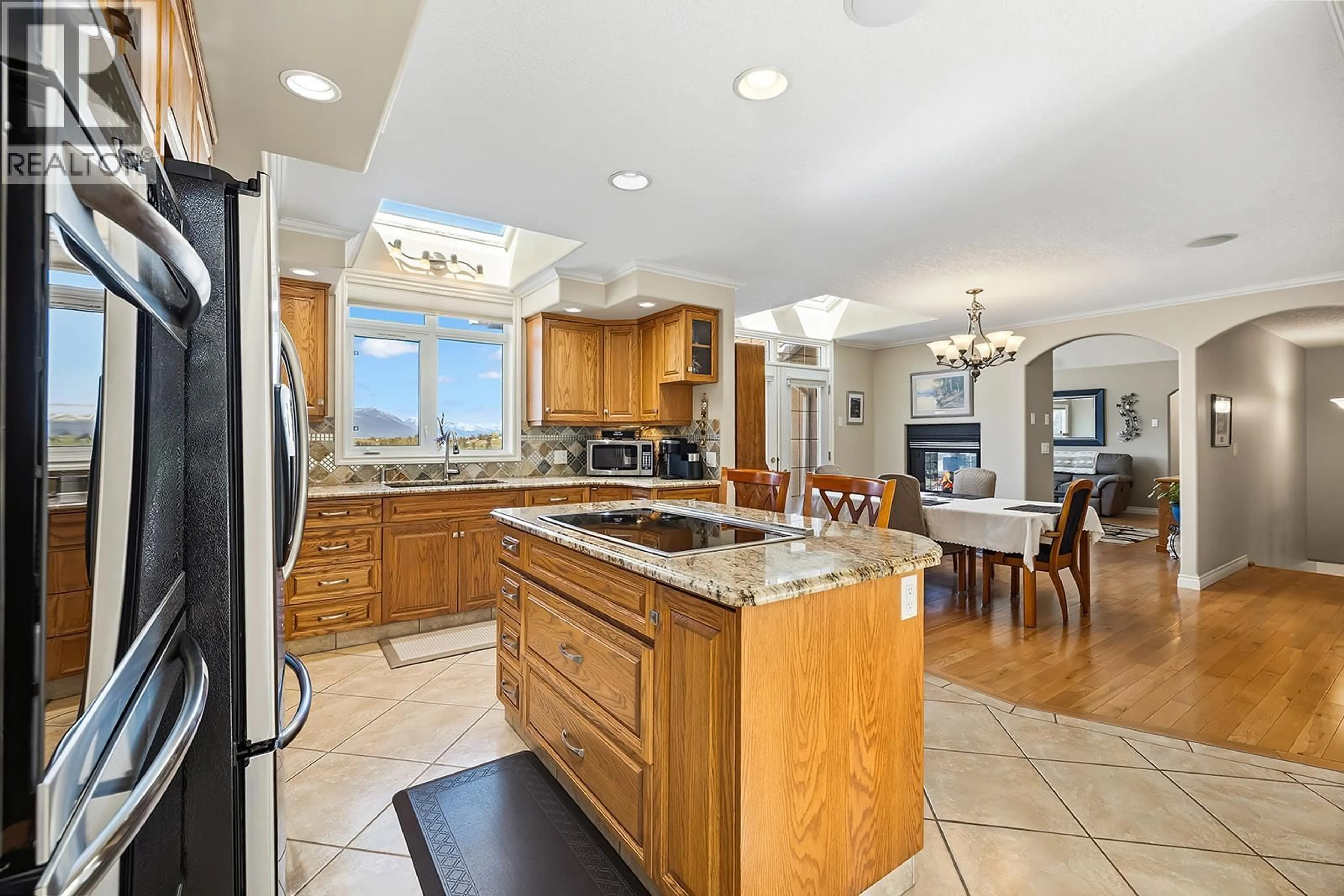 Open concept kitchen, ceramic/tile floor for 2489 38TH STREET, Canyon British Columbia V0B1G2