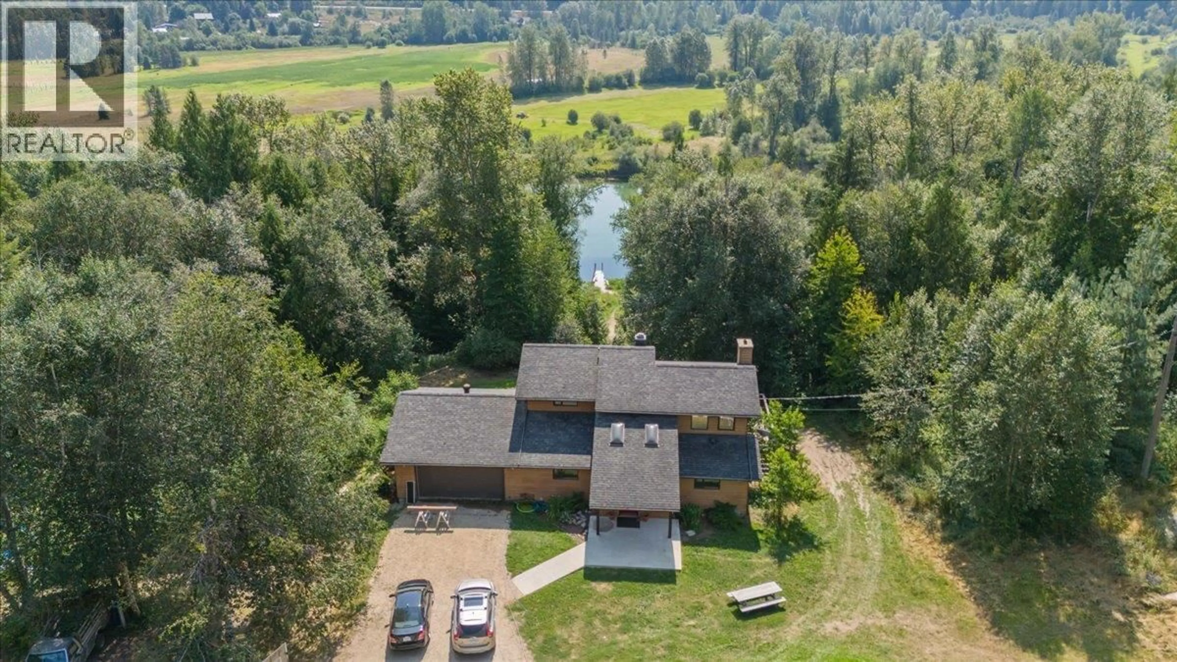 A pic from outside/outdoor area/front of a property/back of a property/a pic from drone, water/lake/river/ocean view for 6172 SLOCAN RIVER ROAD, Winlaw British Columbia V0G2J0
