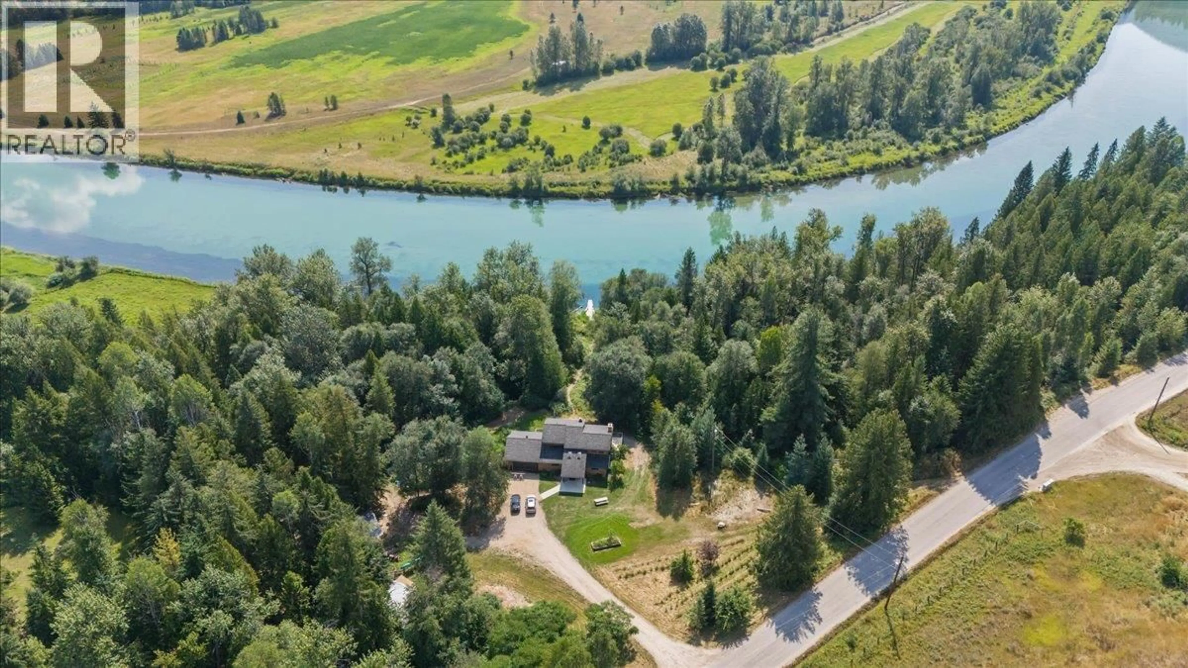 A pic from outside/outdoor area/front of a property/back of a property/a pic from drone, water/lake/river/ocean view for 6172 SLOCAN RIVER ROAD, Winlaw British Columbia V0G2J0