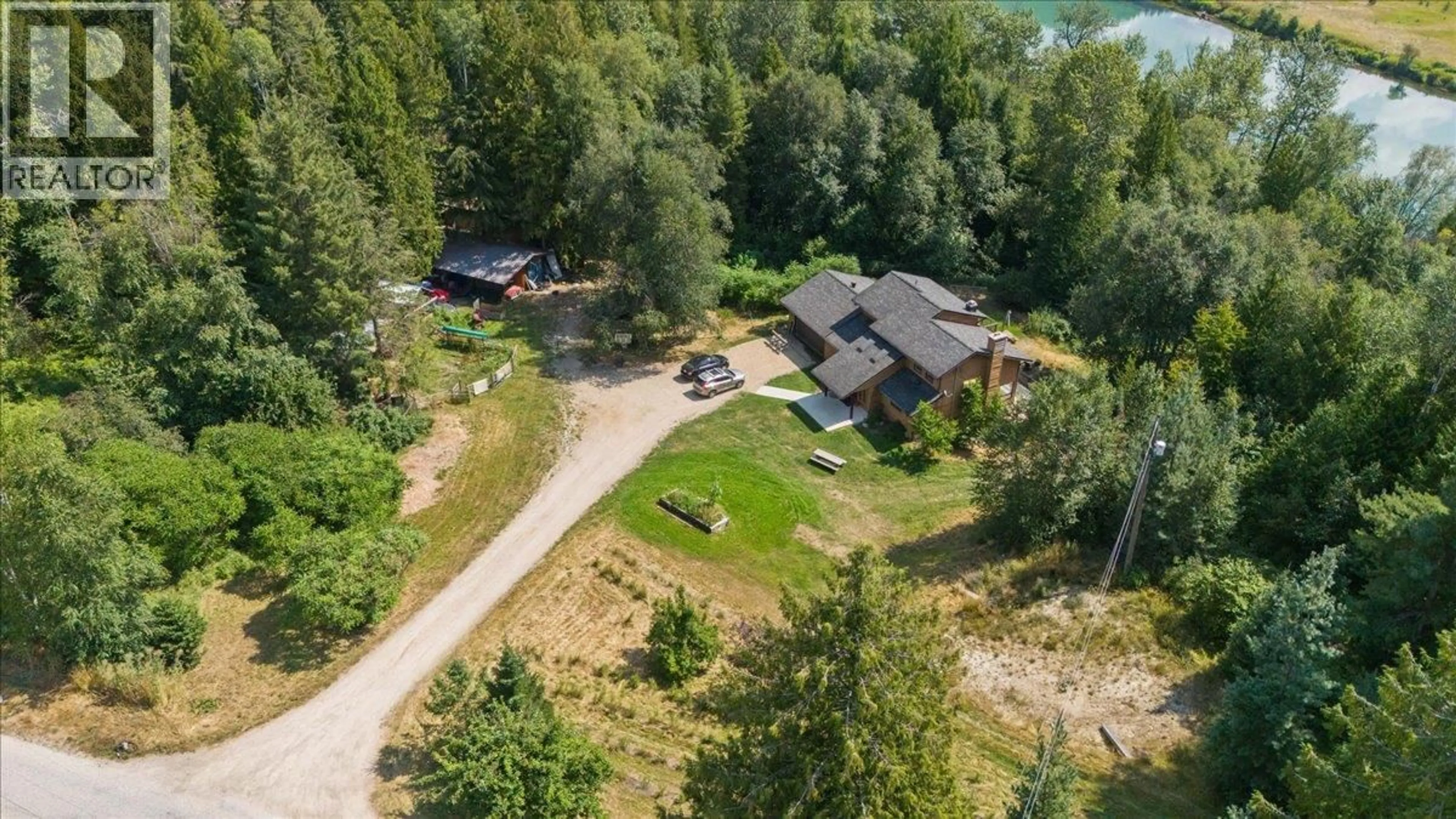 A pic from outside/outdoor area/front of a property/back of a property/a pic from drone, water/lake/river/ocean view for 6172 SLOCAN RIVER ROAD, Winlaw British Columbia V0G2J0
