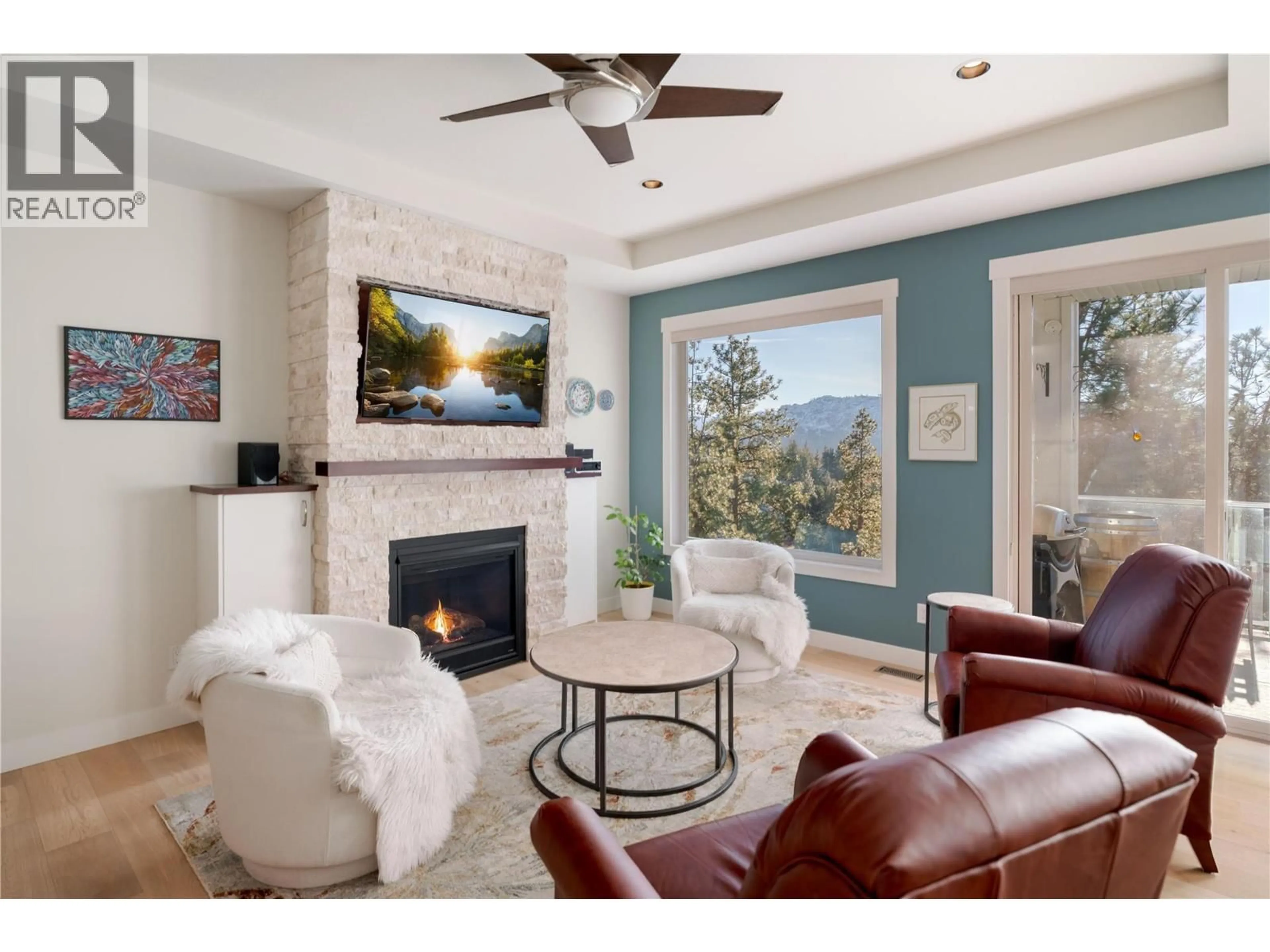 Living room with furniture, ceramic/tile floor for 1431 ROSERIDGE COURT, West Kelowna British Columbia V1Z4E2