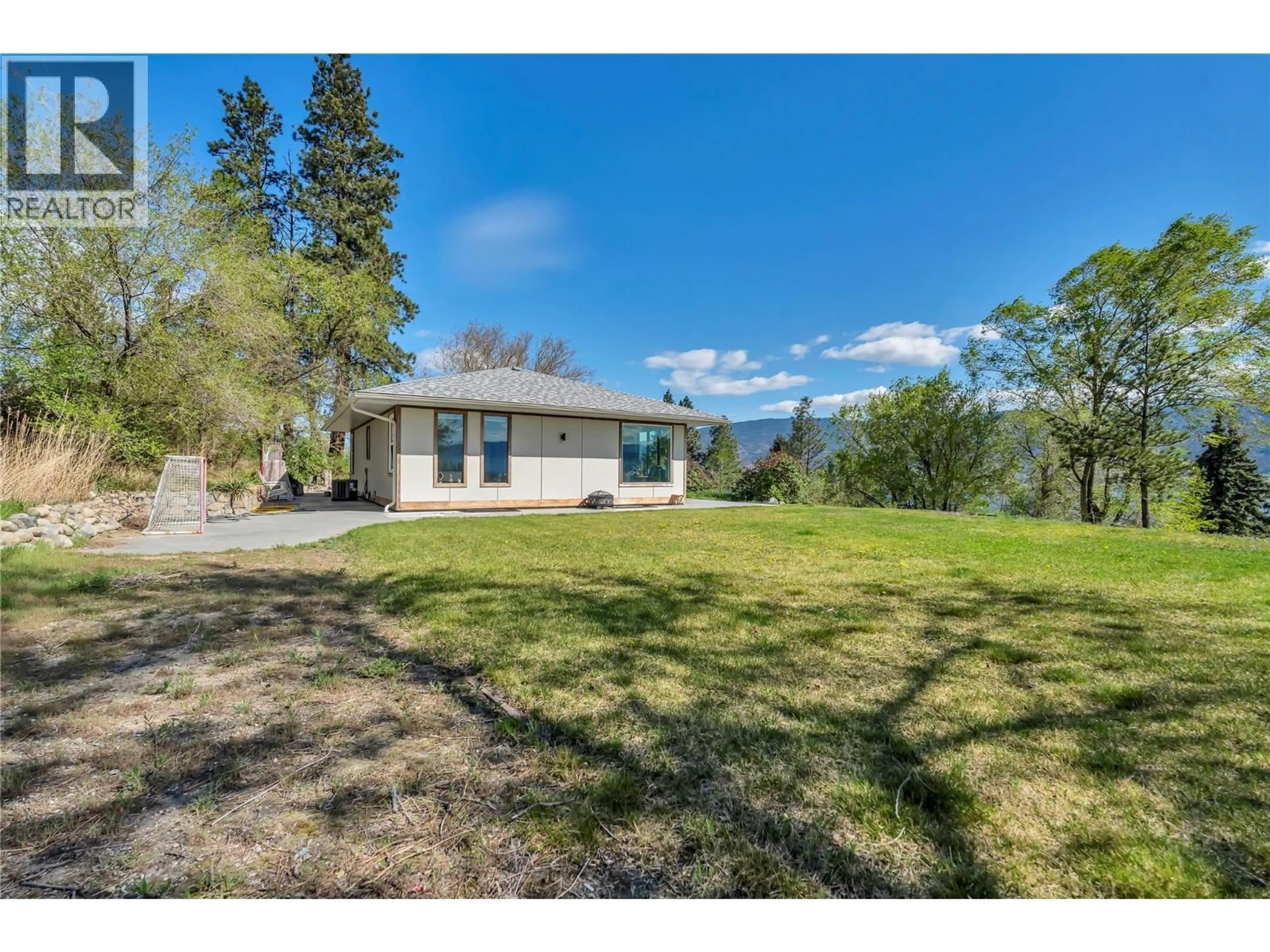 A pic from outside/outdoor area/front of a property/back of a property/a pic from drone, mountain view for 3909 GARTRELL ROAD, Summerland British Columbia V0H1Z4