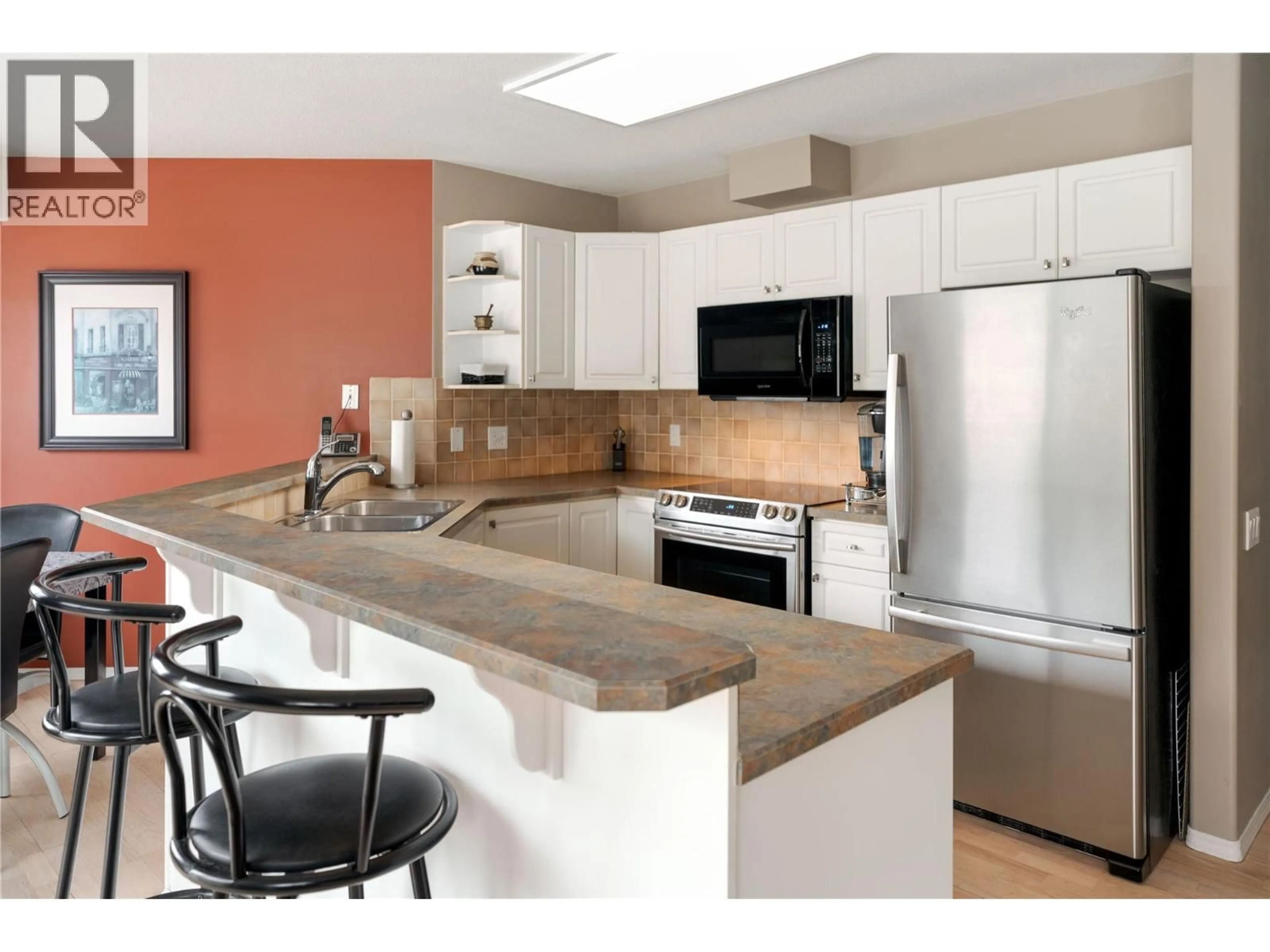 Open concept kitchen, ceramic/tile floor for 115 - 980 DILWORTH DRIVE, Kelowna British Columbia V1V1S6