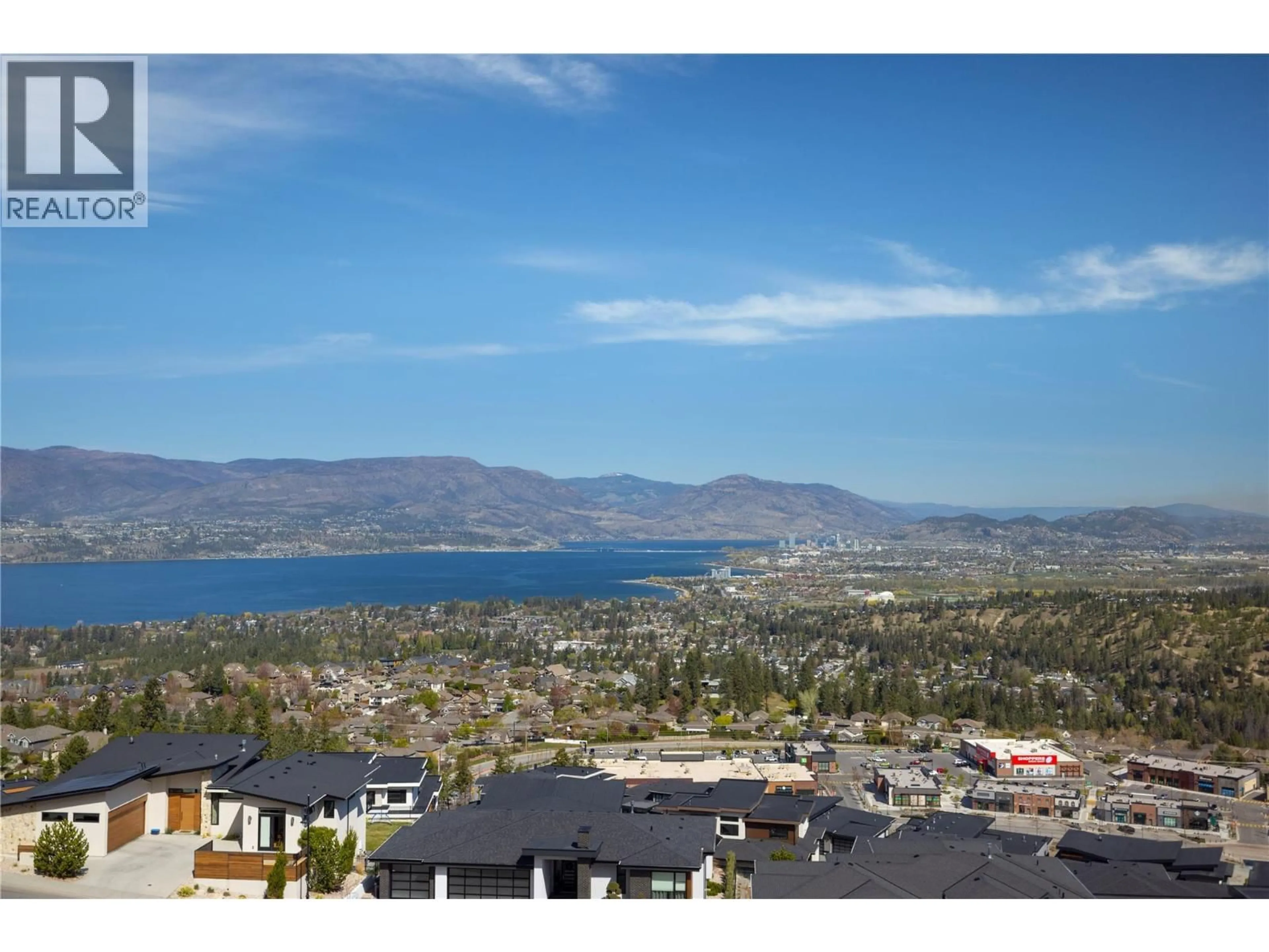 A pic from outside/outdoor area/front of a property/back of a property/a pic from drone, mountain view for 1010 LAMONT COURT, Kelowna British Columbia V1W5J1