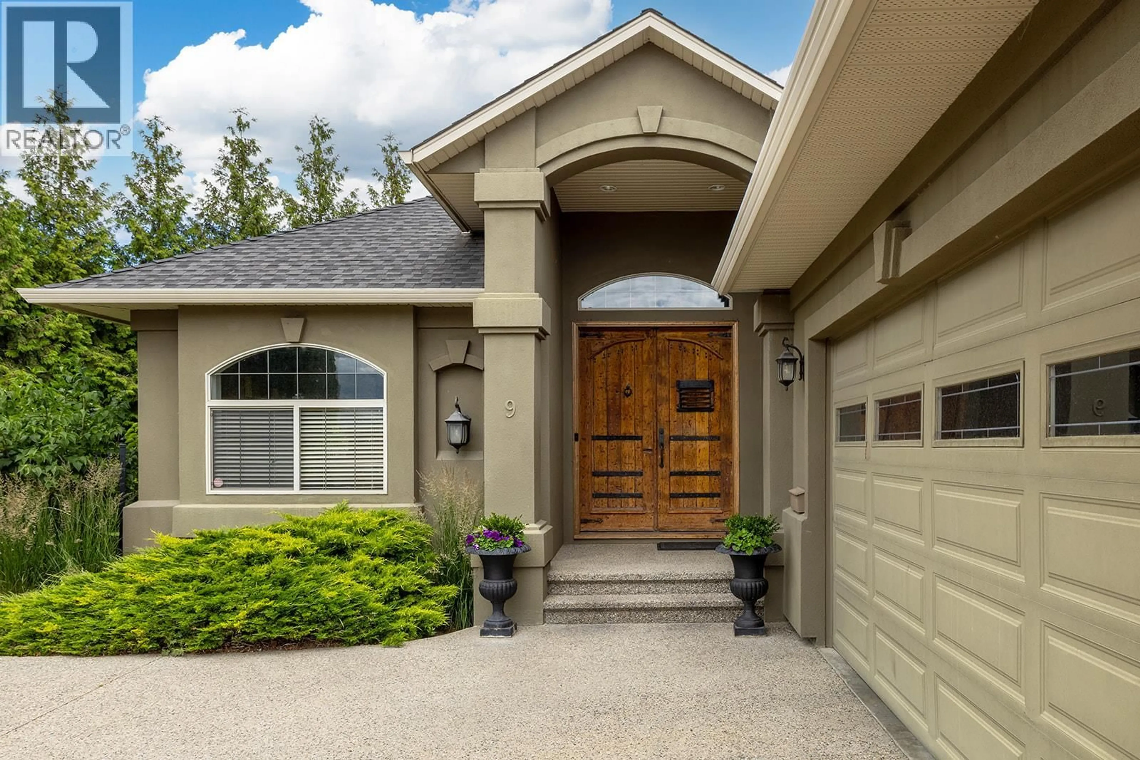 Home with vinyl exterior material, street for 3103 THACKER DRIVE, West Kelowna British Columbia V1Z1X5
