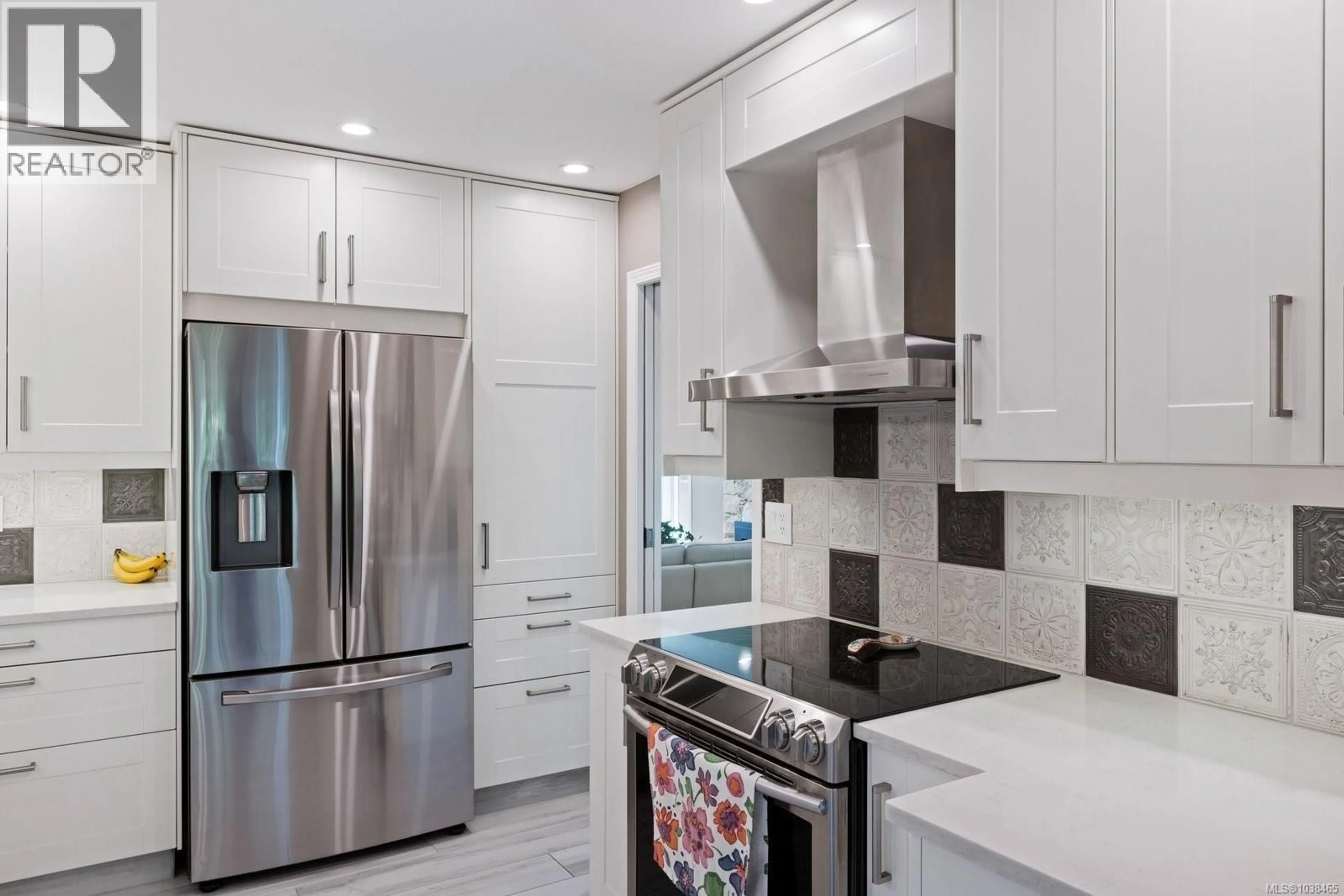 Contemporary kitchen, ceramic/tile floor for 8615 SENTINEL PLACE, North Saanich British Columbia V8L4Z8