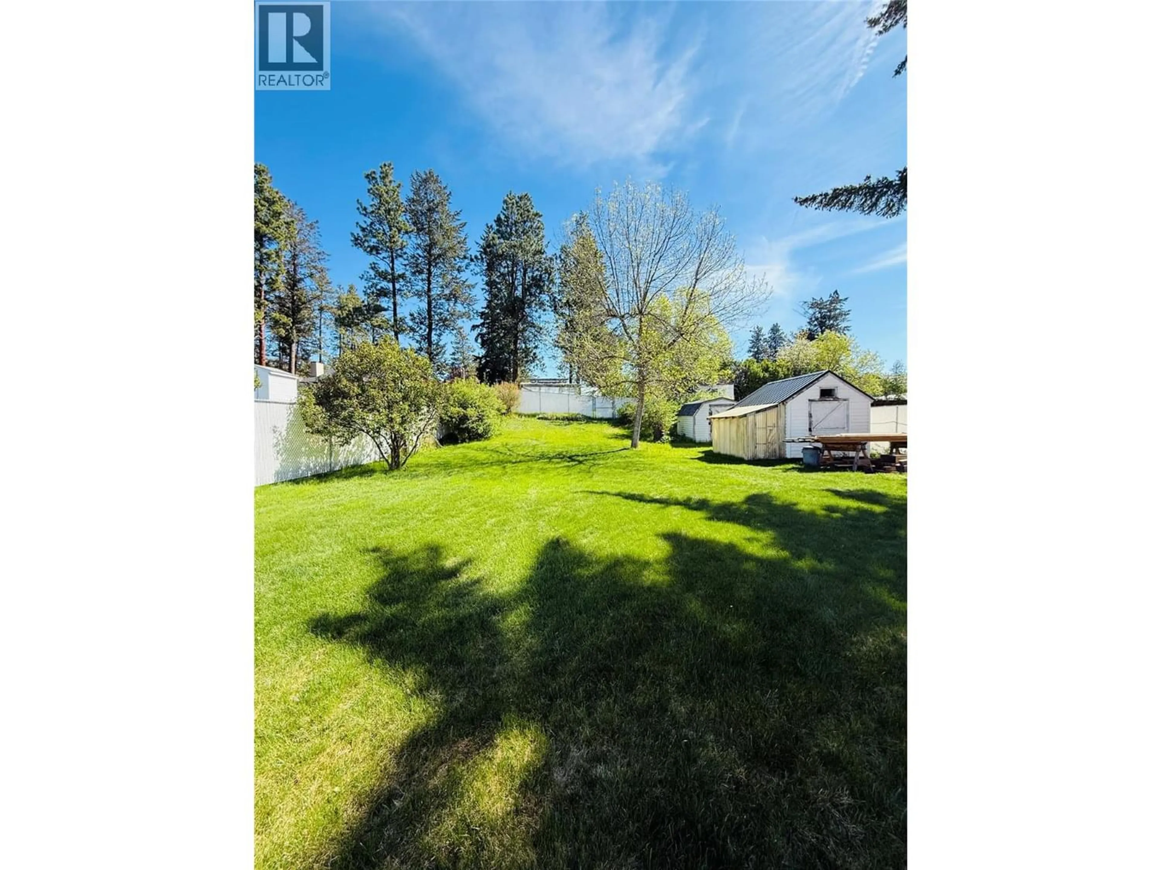 A pic from outside/outdoor area/front of a property/back of a property/a pic from drone, forest/trees view for 254 304TH AVENUE, Kimberley British Columbia V1A3G6