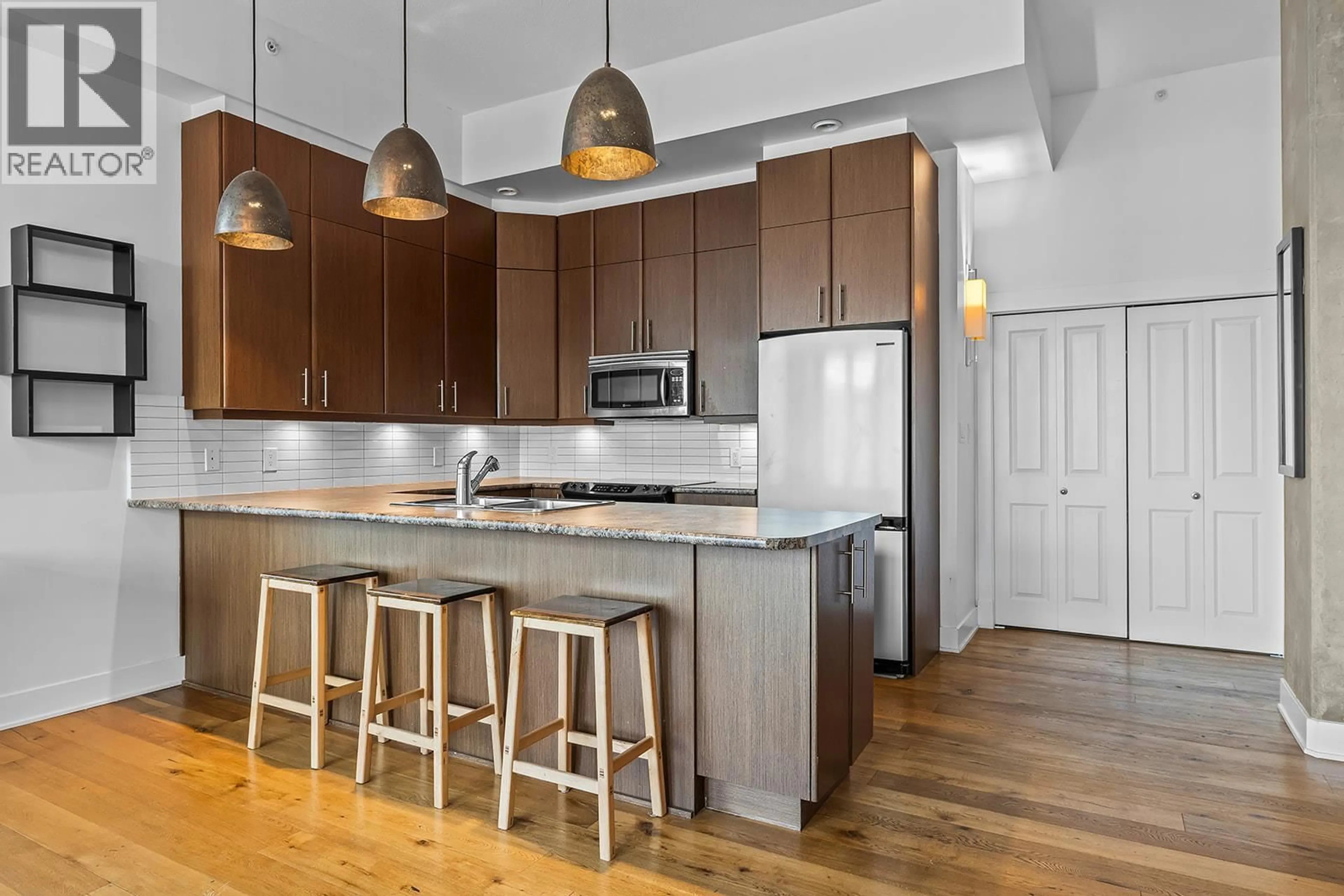 Open concept kitchen, unknown for 204 - 1329 ELLIS STREET, Kelowna British Columbia V1Y9X5