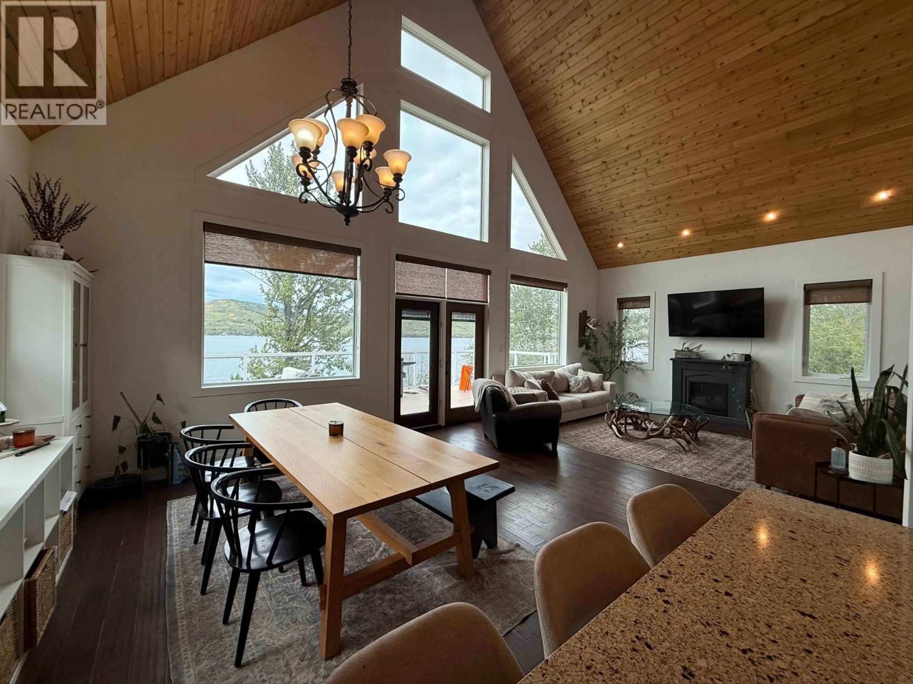 Open concept kitchen, wood/laminate floor for 6986 SOUTH MOBERLY LAKE ROAD, Moberly Lake British Columbia V0C1X0