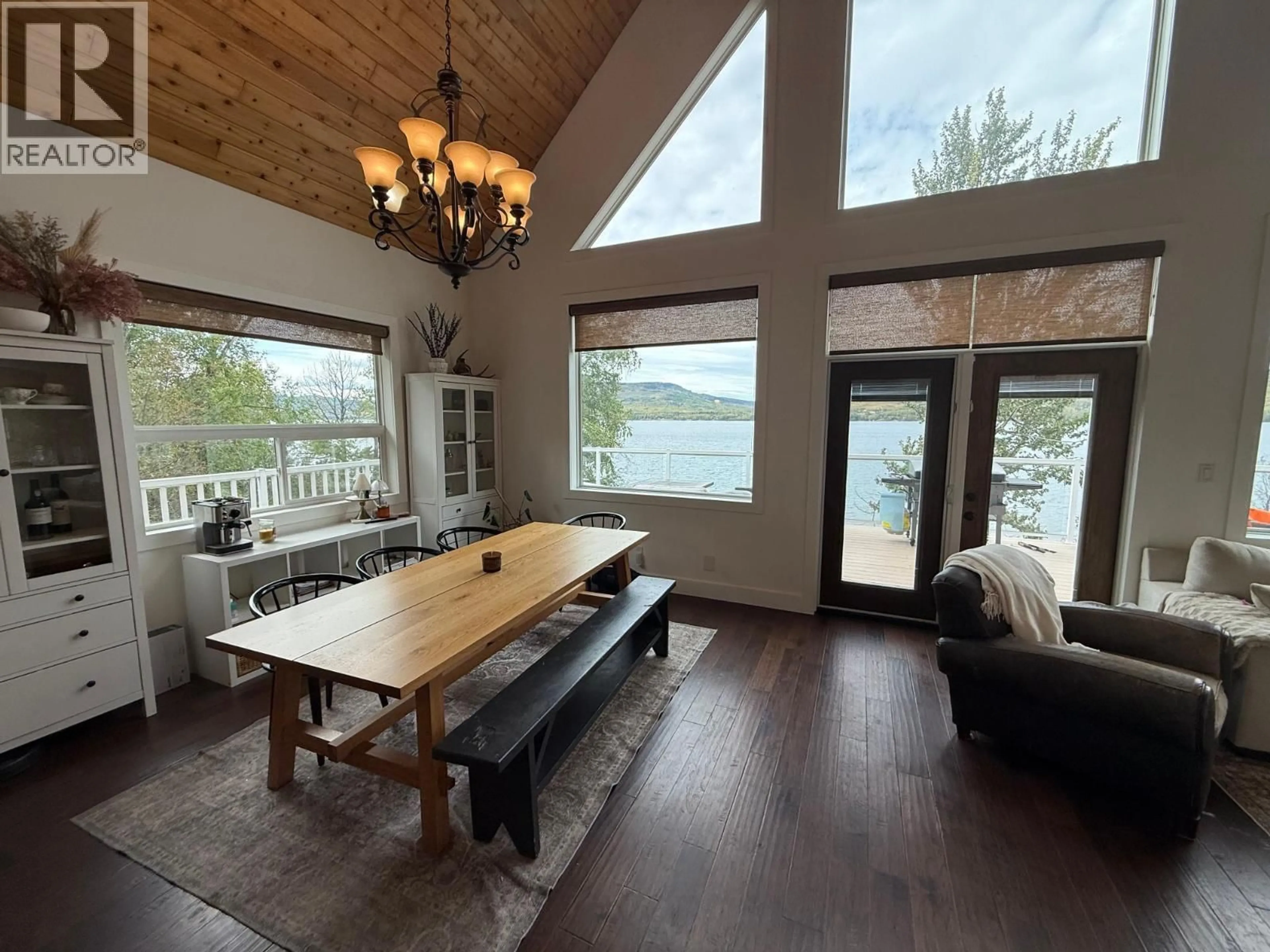 Dining room, wood/laminate floor for 6986 SOUTH MOBERLY LAKE ROAD, Moberly Lake British Columbia V0C1X0