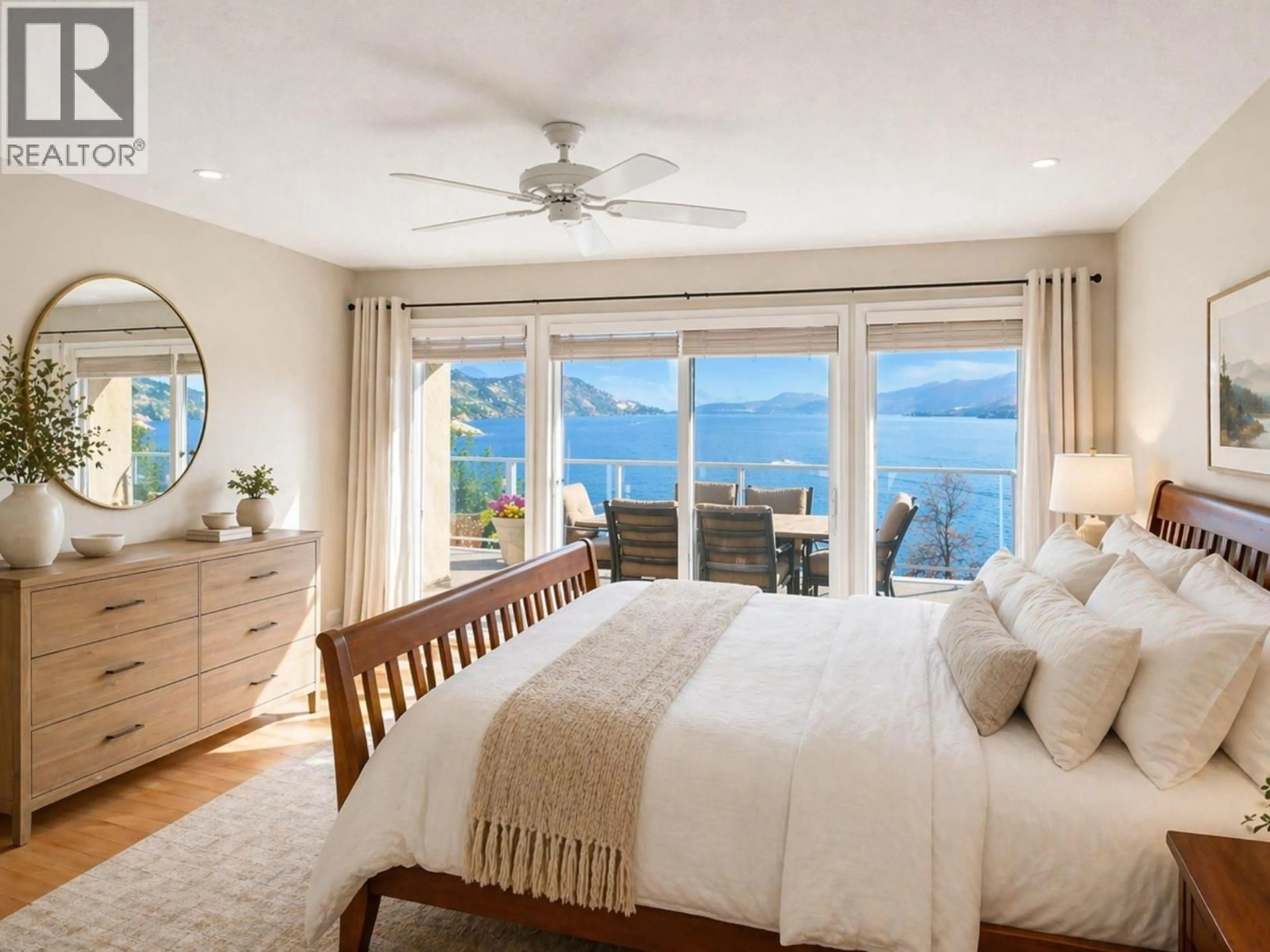 Bedroom with bed, wood/laminate floor for 1988 DEWDNEY ROAD, Kelowna British Columbia V1V2C3