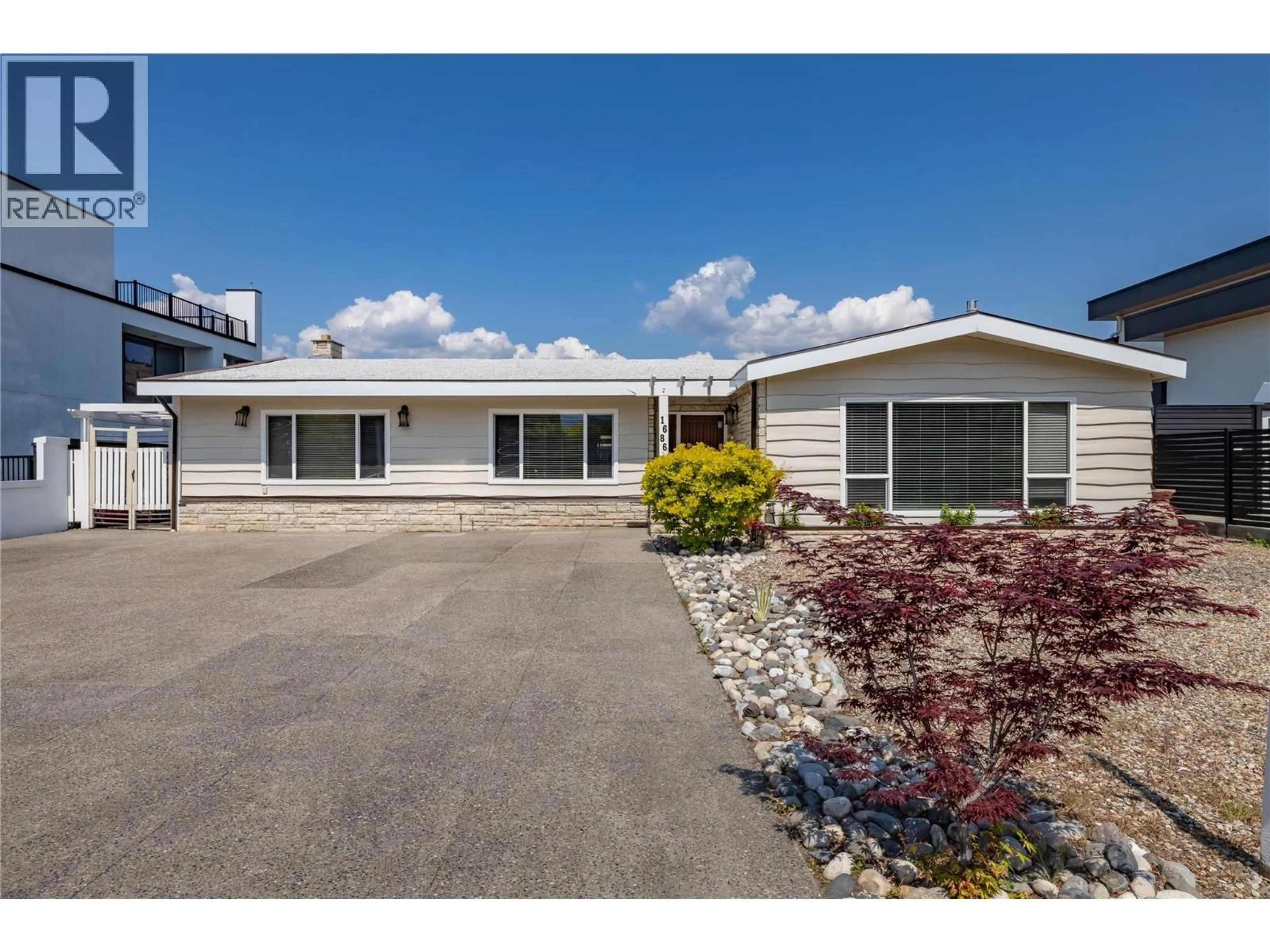 Home with vinyl exterior material, street for 1686 PRITCHARD DRIVE, West Kelowna British Columbia V4T1X5