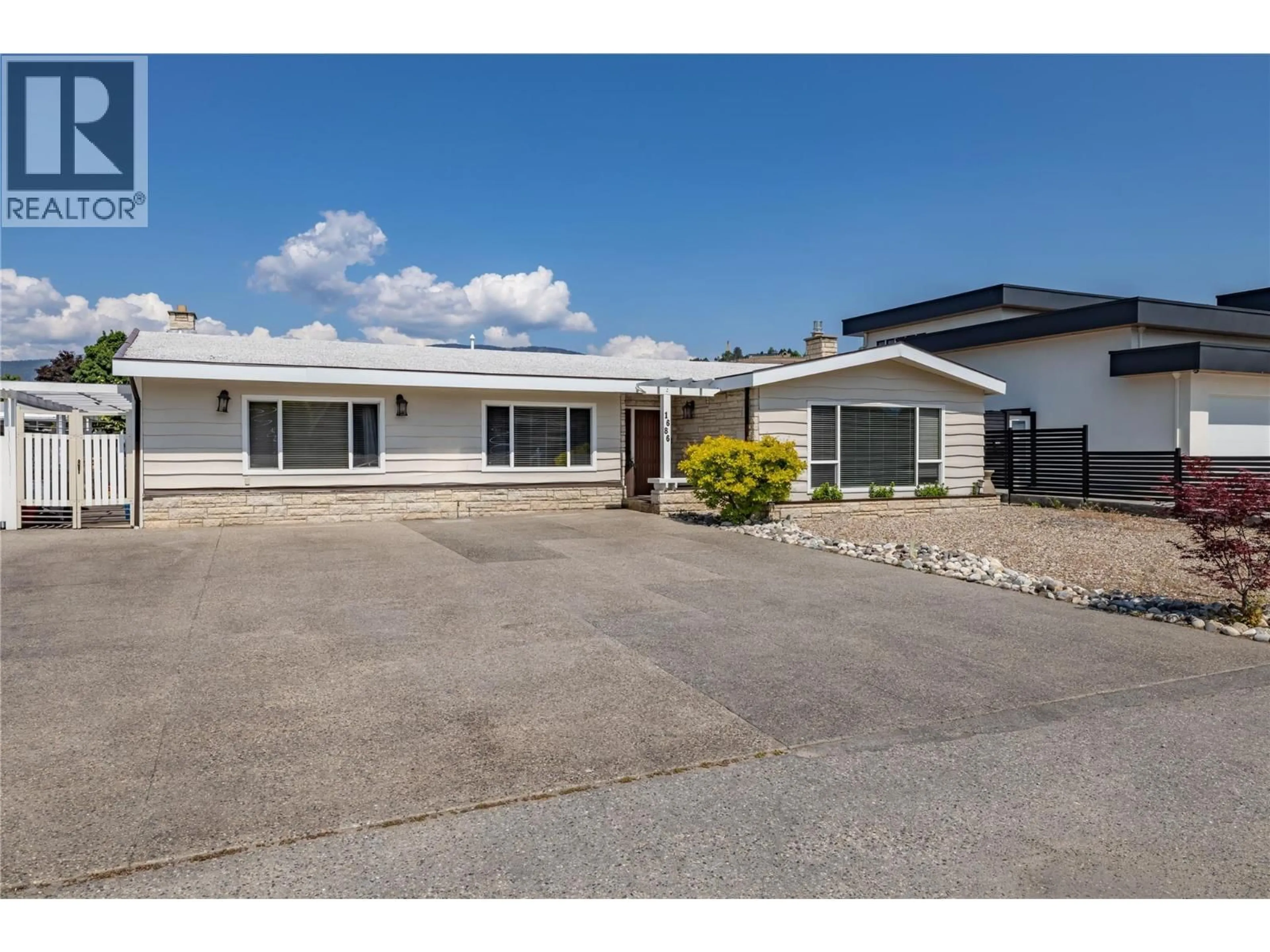 A pic from outside/outdoor area/front of a property/back of a property/a pic from drone, street for 1686 PRITCHARD DRIVE, West Kelowna British Columbia V4T1X5
