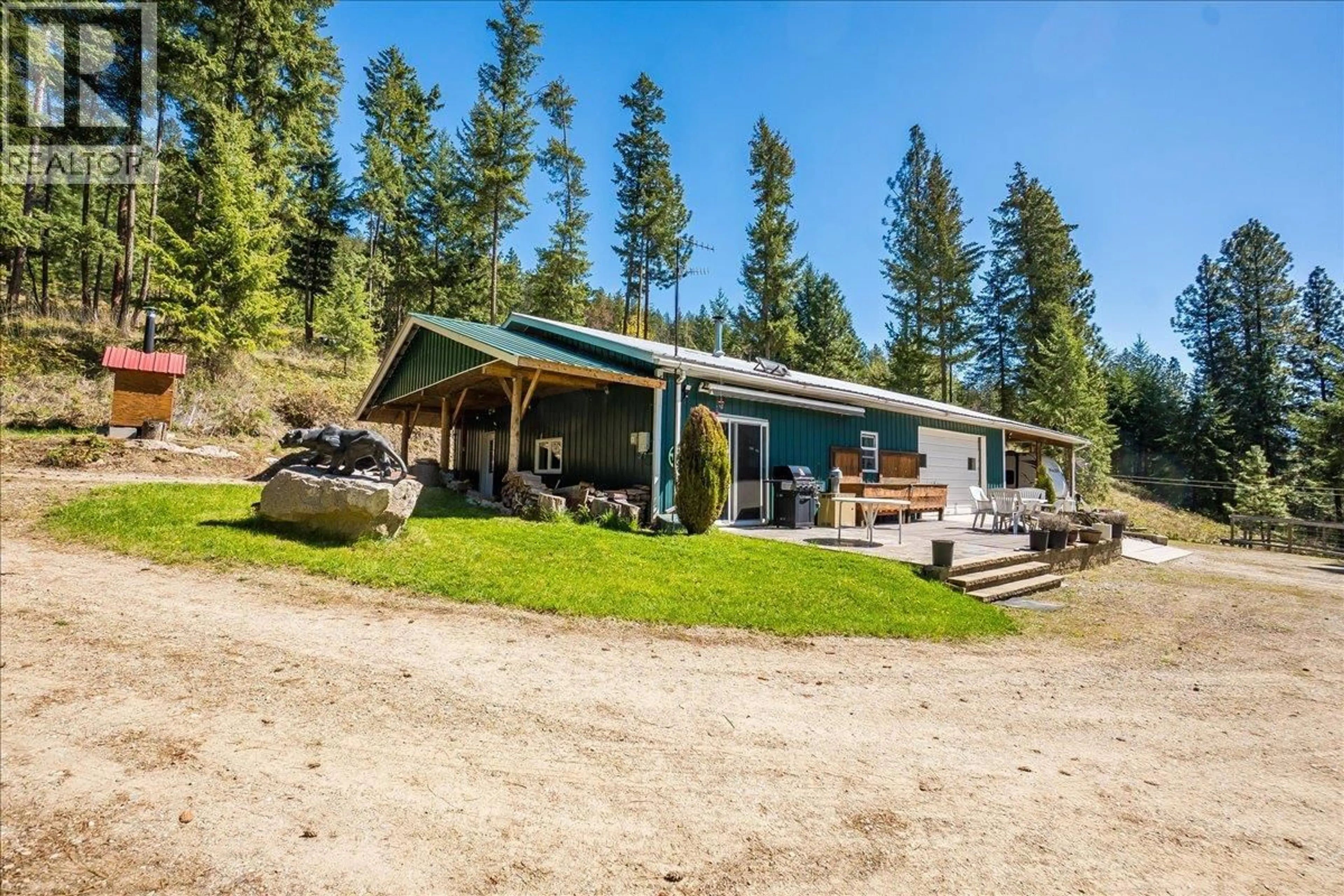 A pic from outside/outdoor area/front of a property/back of a property/a pic from drone, mountain view for 7465 BROADWATER ROAD, Castlegar British Columbia V1N4V8