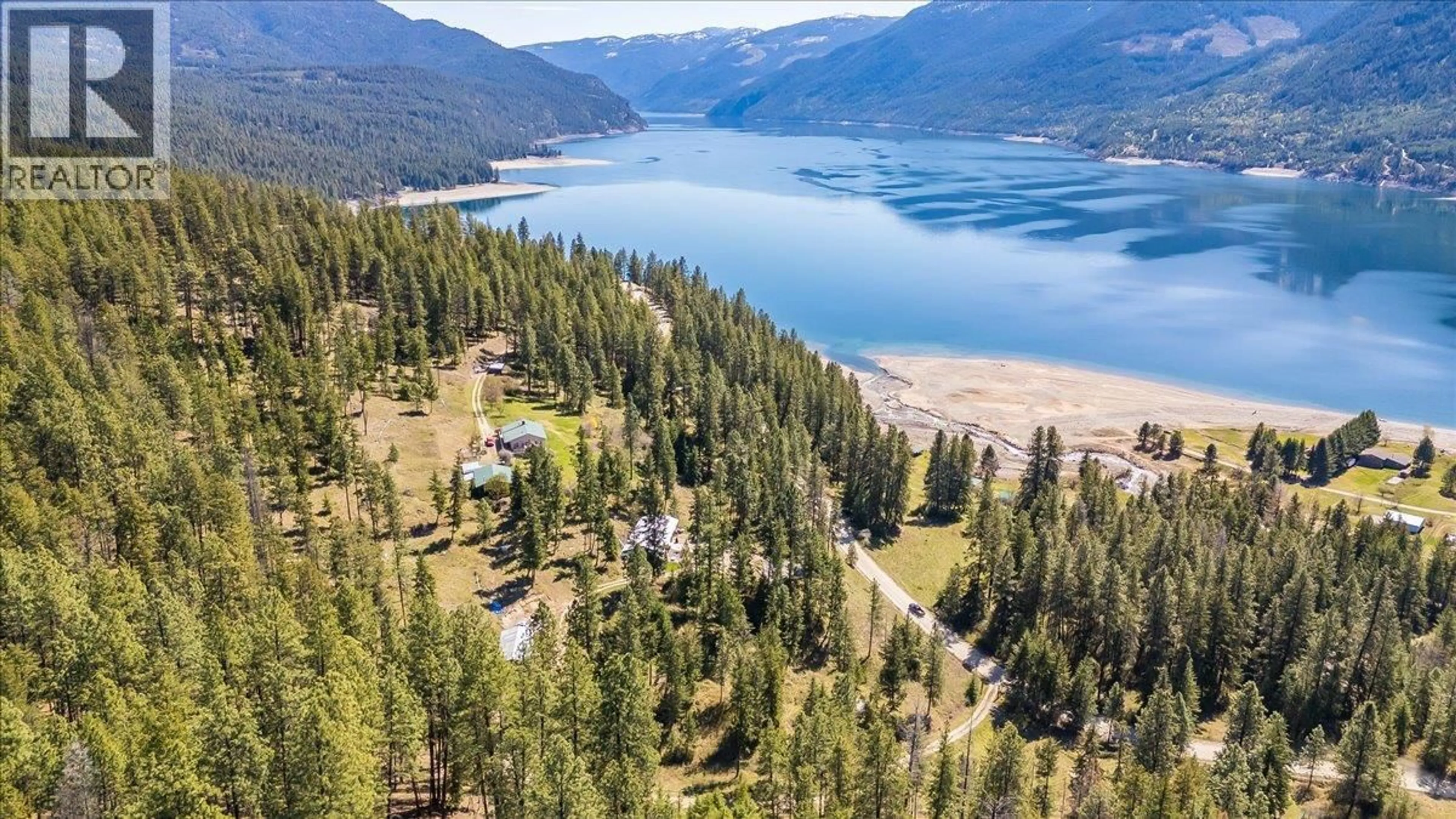 A pic from outside/outdoor area/front of a property/back of a property/a pic from drone, water/lake/river/ocean view for 7465 BROADWATER ROAD, Castlegar British Columbia V1N4V8