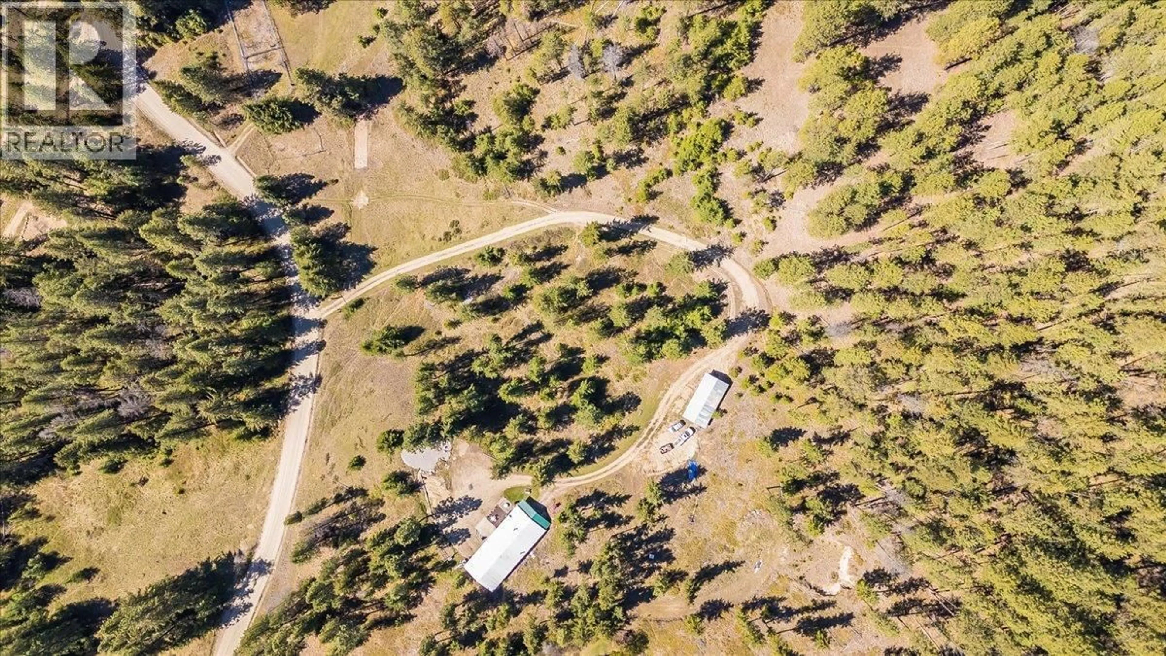 A pic from outside/outdoor area/front of a property/back of a property/a pic from drone, forest/trees view for 7465 BROADWATER ROAD, Castlegar British Columbia V1N4V8