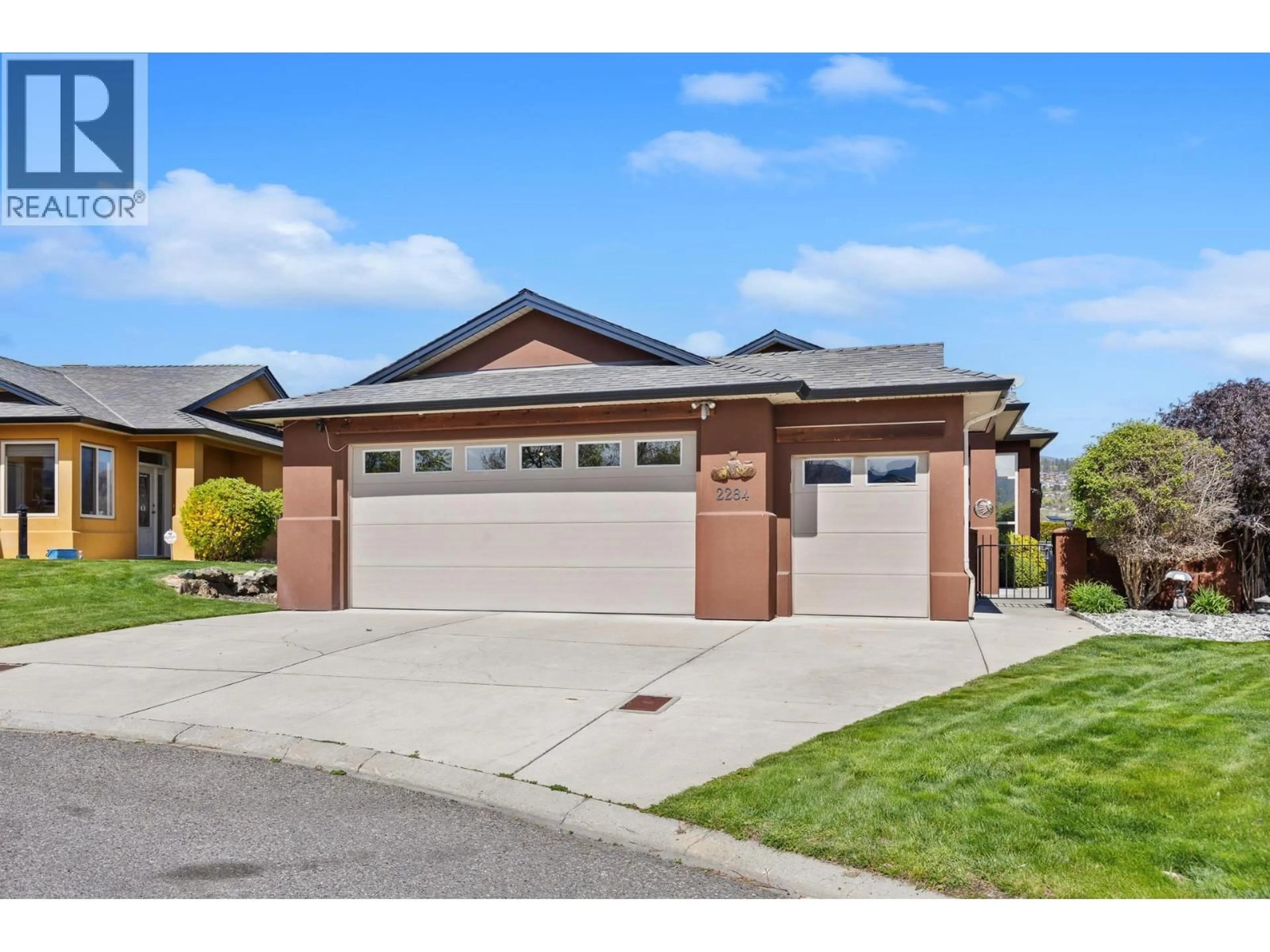 Home with brick exterior material, street for 2284 PINE VISTA PLACE, Westbank British Columbia V4T2Y1