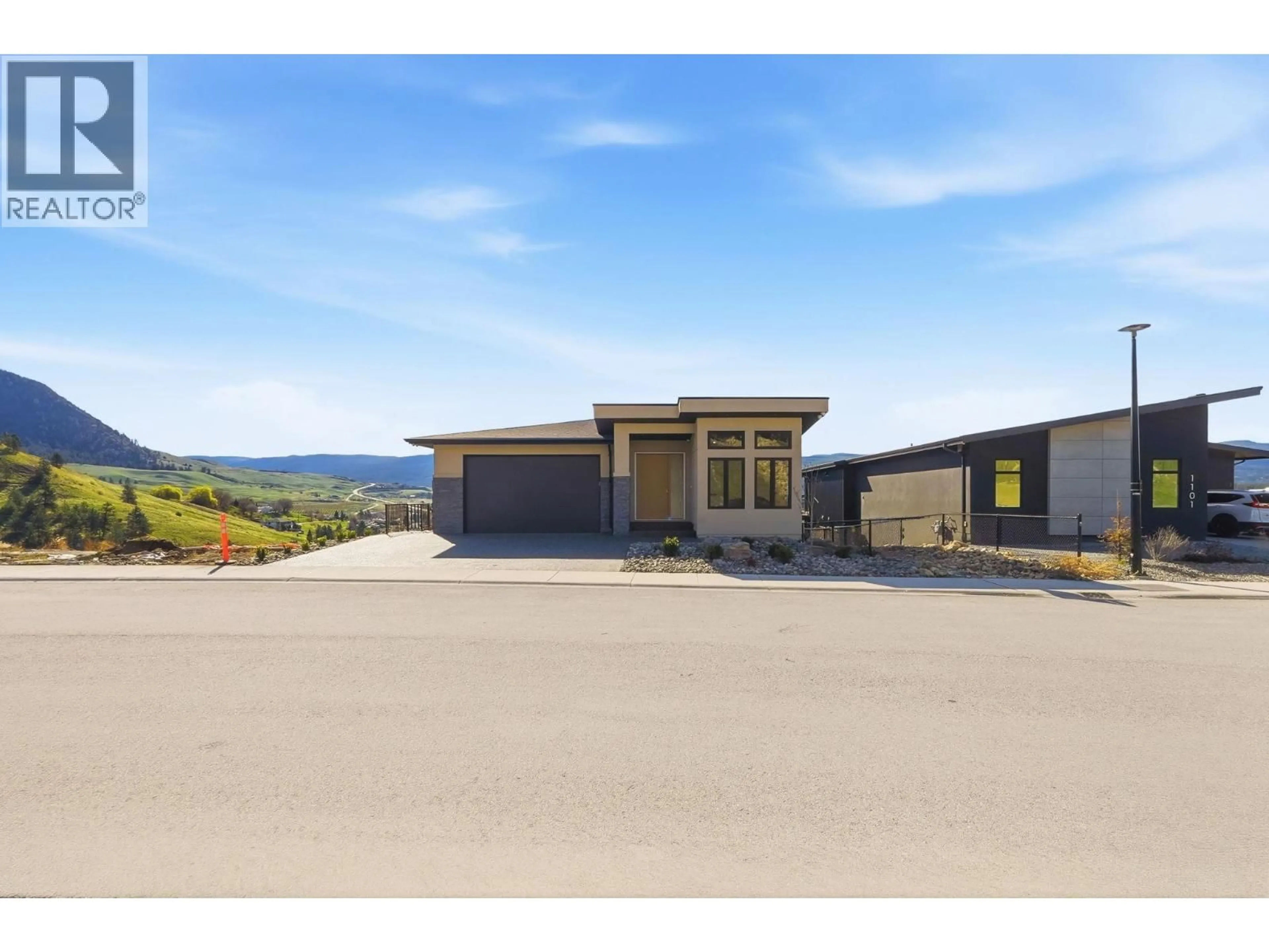 A pic from outside/outdoor area/front of a property/back of a property/a pic from drone, unknown for 1087 CARNOUSTIE DRIVE, Kelowna British Columbia V1P0A3