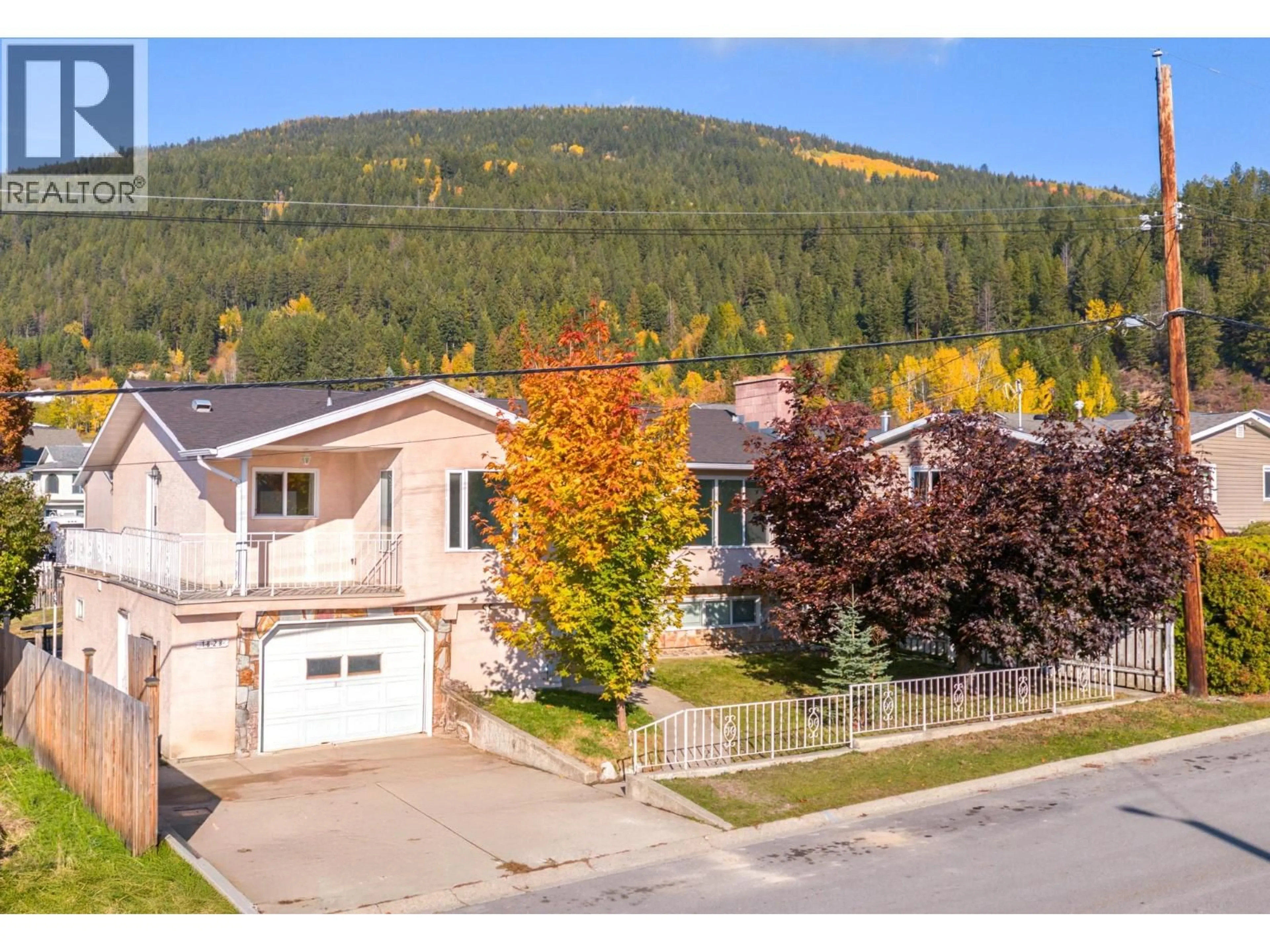 A pic from outside/outdoor area/front of a property/back of a property/a pic from drone, mountain view for 1828 HURL STREET, Creston British Columbia V0B1G5
