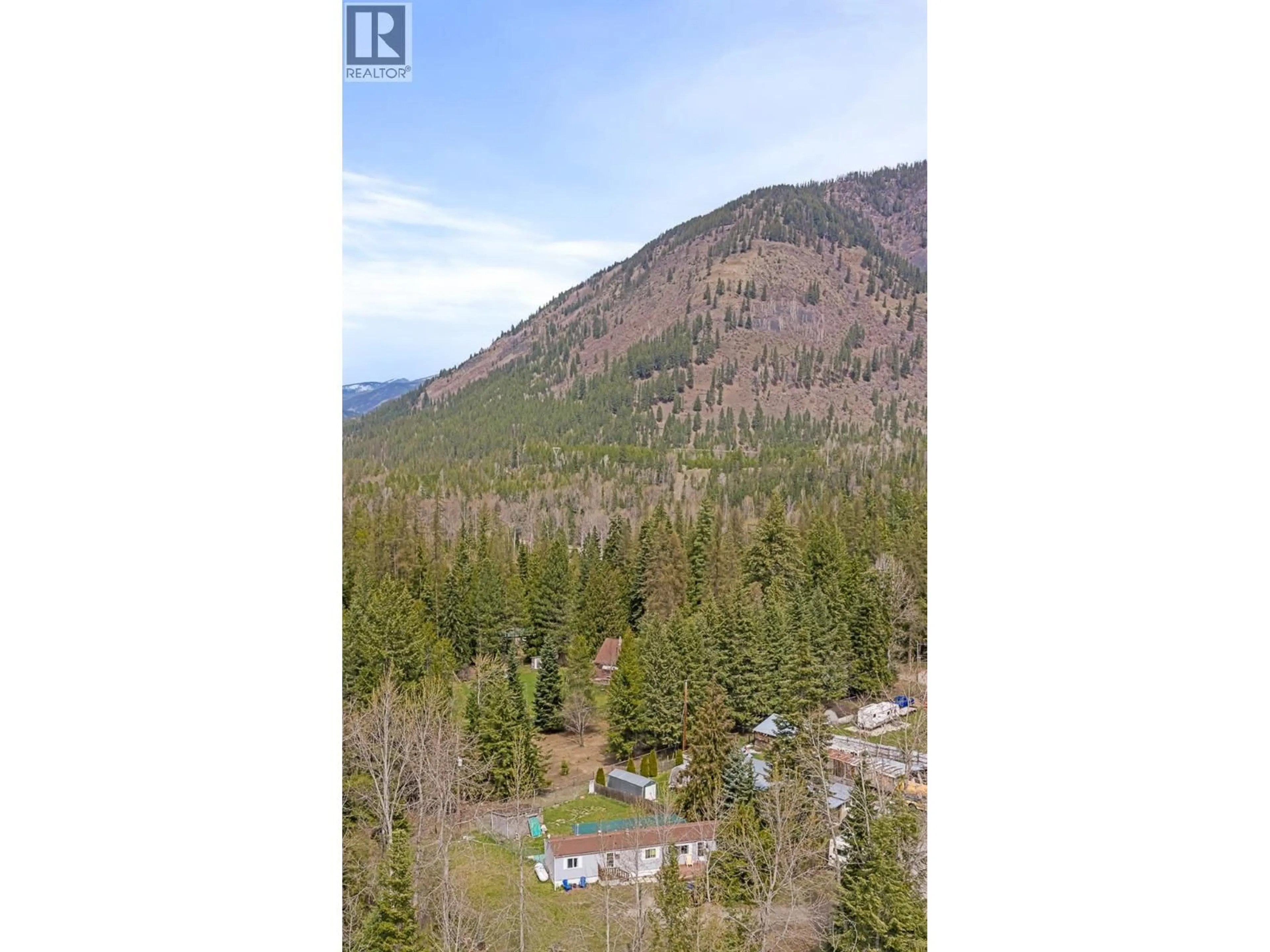 A pic from outside/outdoor area/front of a property/back of a property/a pic from drone, forest/trees view for 5702 BERTHA AVENUE, Kitchener British Columbia V0B1W1