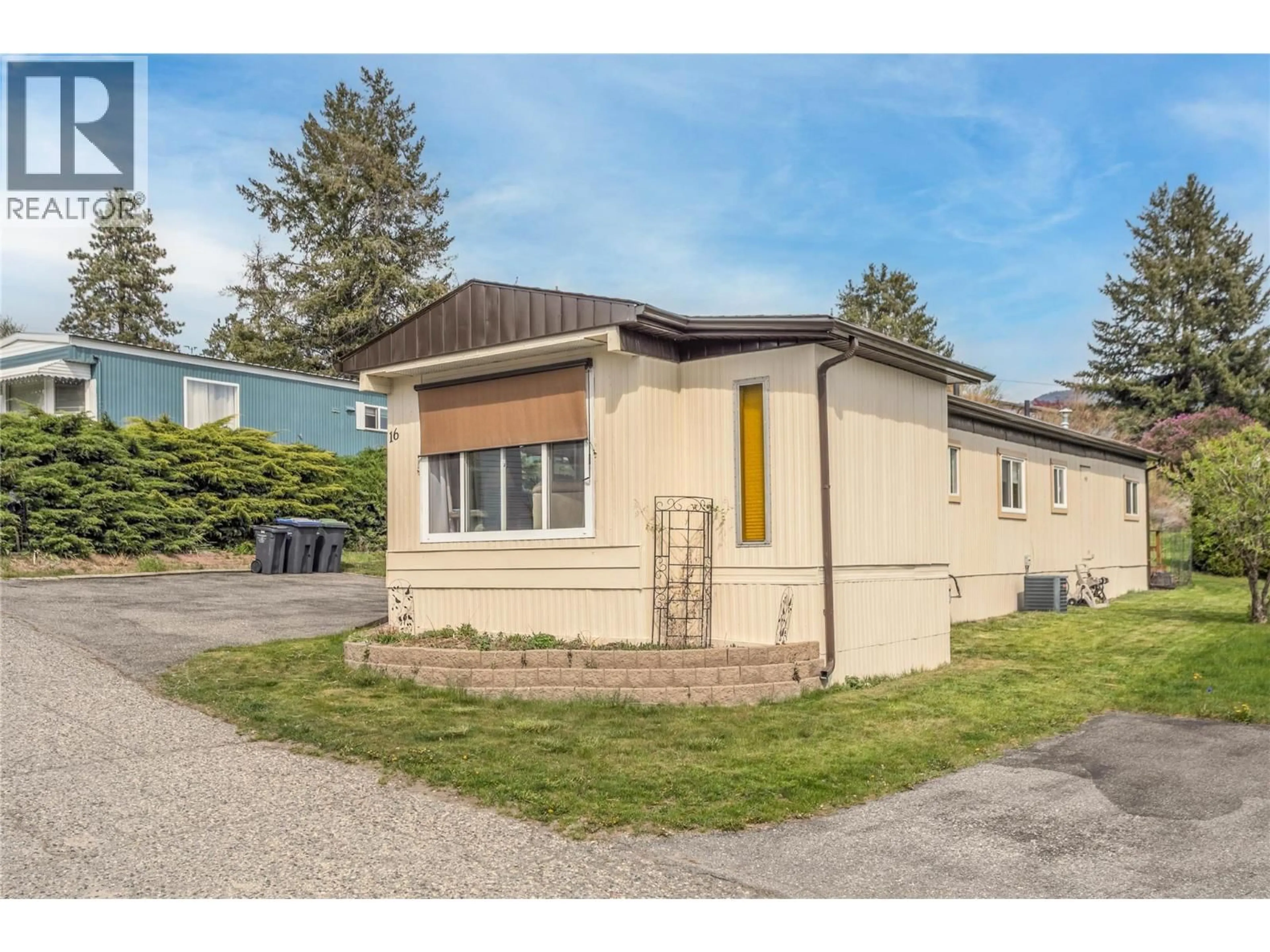 Home with vinyl exterior material, street for 16 - #16-12022 PRETTY ROAD, Lake Country British Columbia V4V1H1