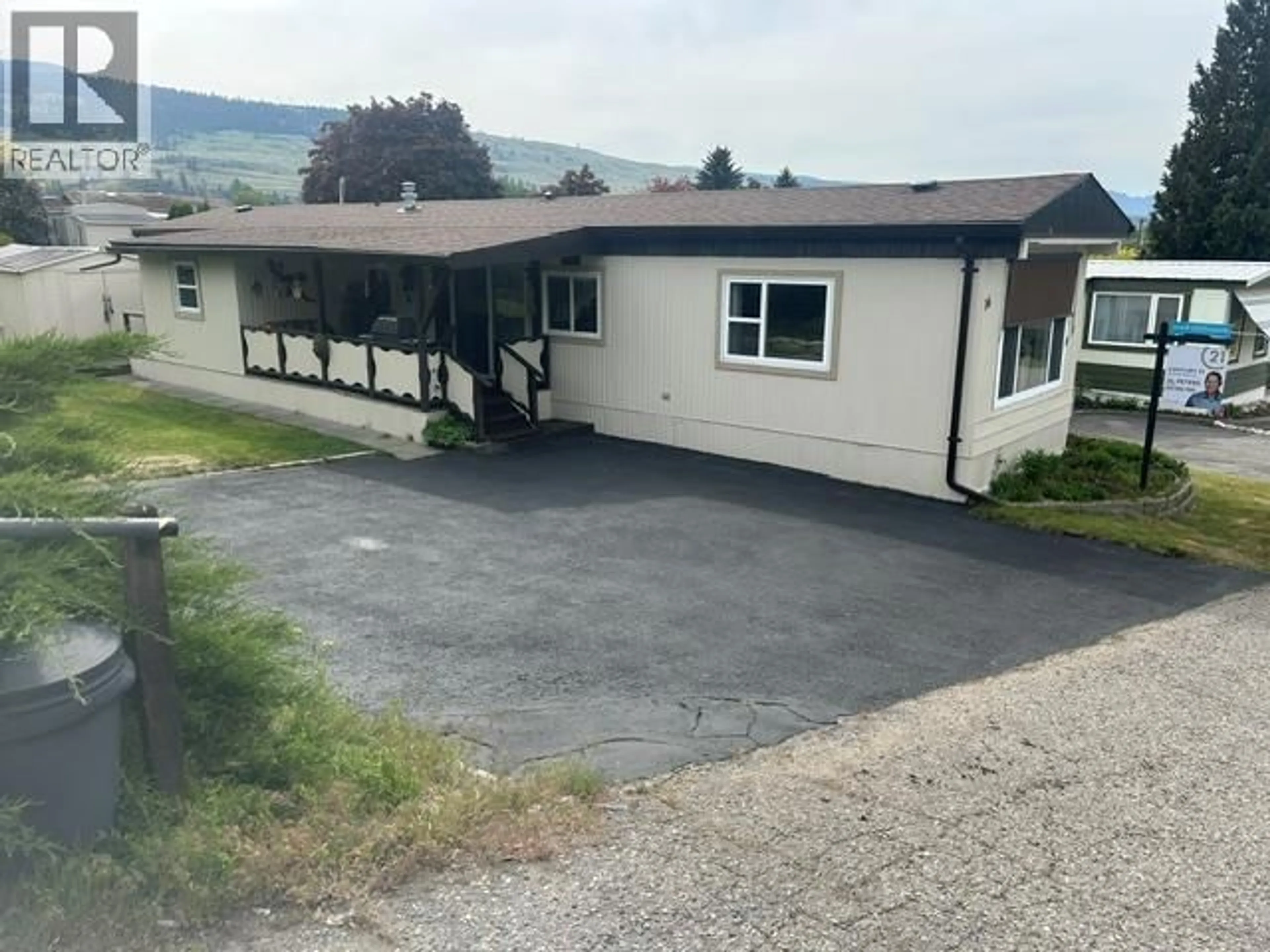 A pic from outside/outdoor area/front of a property/back of a property/a pic from drone, unknown for 16 - #16-12022 PRETTY ROAD, Lake Country British Columbia V4V1H1