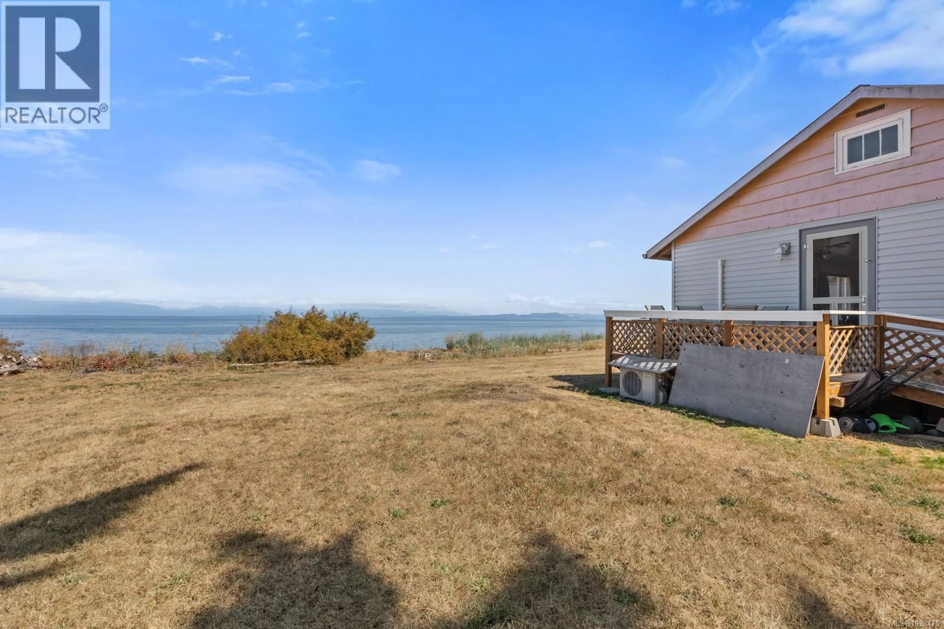 A pic from outside/outdoor area/front of a property/back of a property/a pic from drone, water/lake/river/ocean view for 1494 WILKINSON ROAD, Comox British Columbia V9M4B3