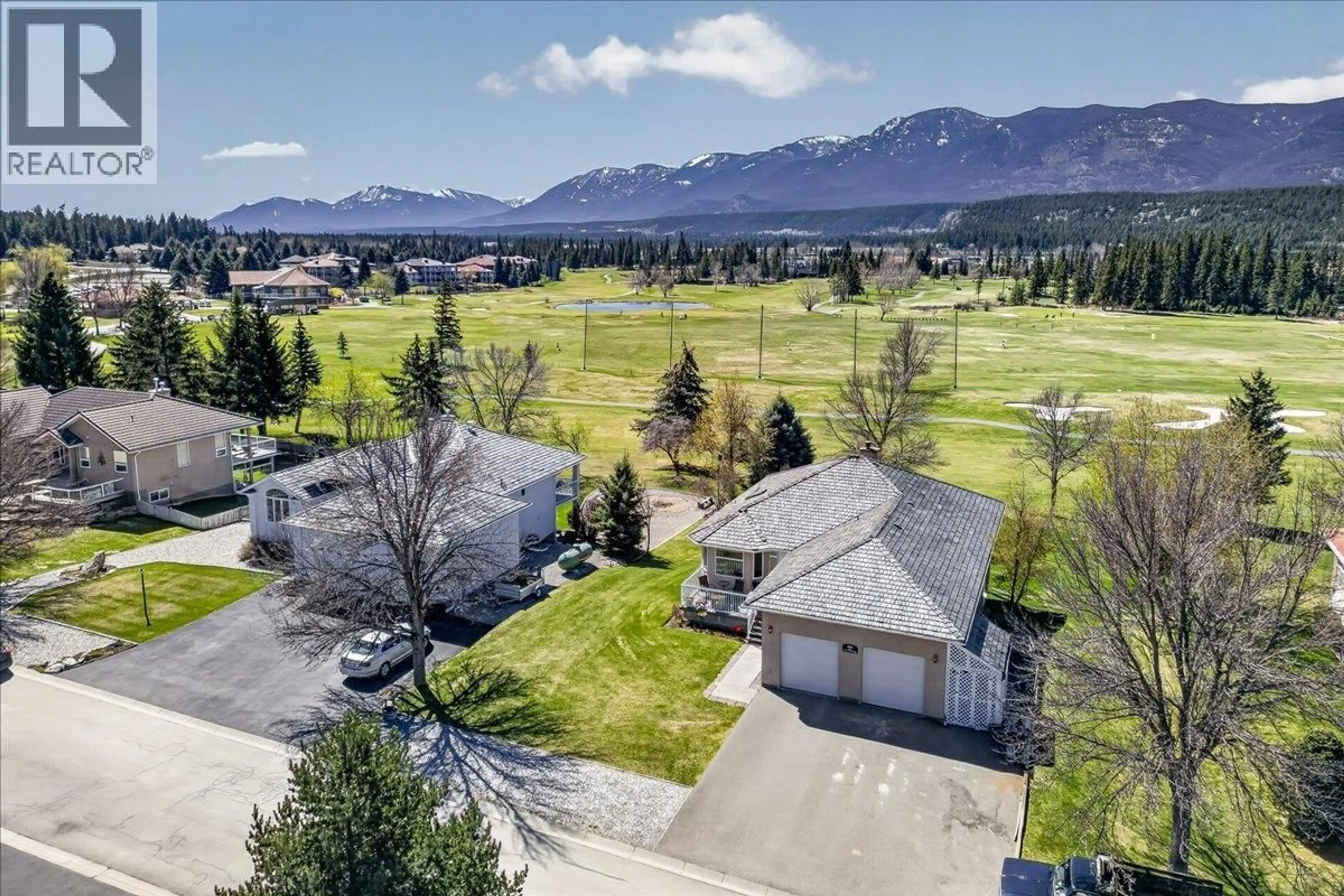 A pic from outside/outdoor area/front of a property/back of a property/a pic from drone, mountain view for 4882 GLEN EAGLE DRIVE, Fairmont Hot Springs British Columbia V0B1L1