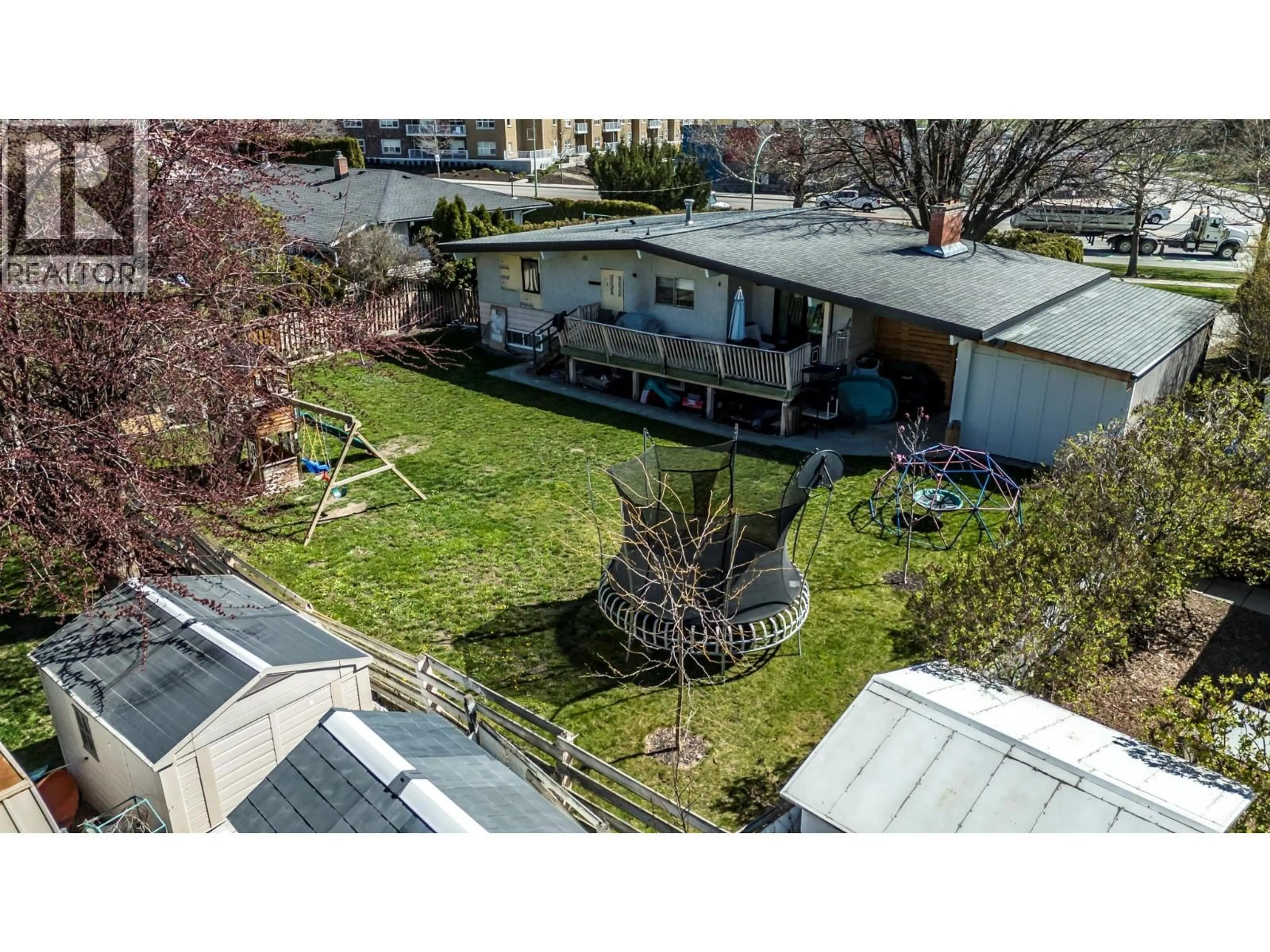 A pic from outside/outdoor area/front of a property/back of a property/a pic from drone, street for 750 GLENMORE DRIVE, Kelowna British Columbia V1Y4N8