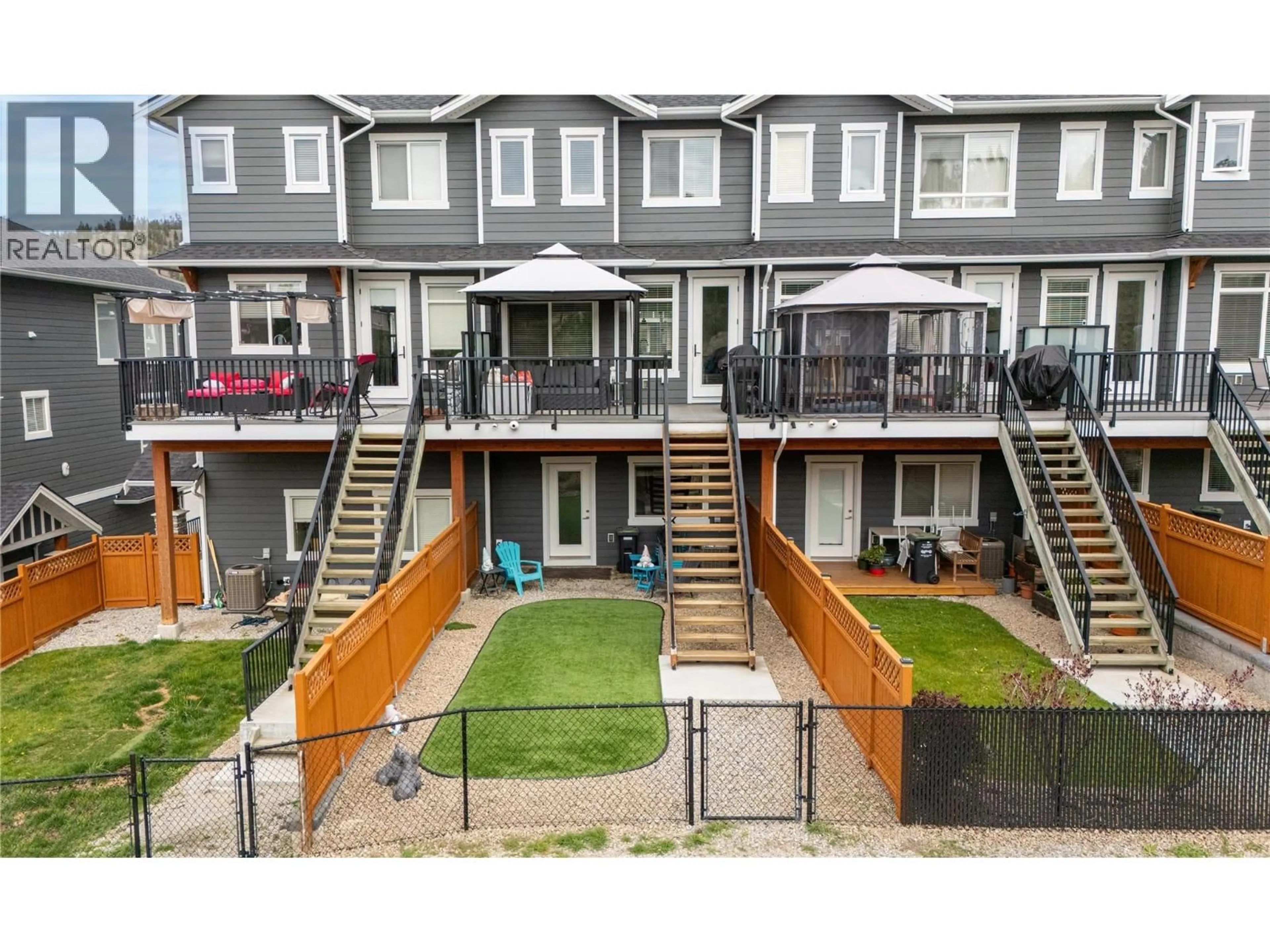 A pic from outside/outdoor area/front of a property/back of a property/a pic from drone, street for 107 - 1115 HOLDEN ROAD, Penticton British Columbia V2A0B7