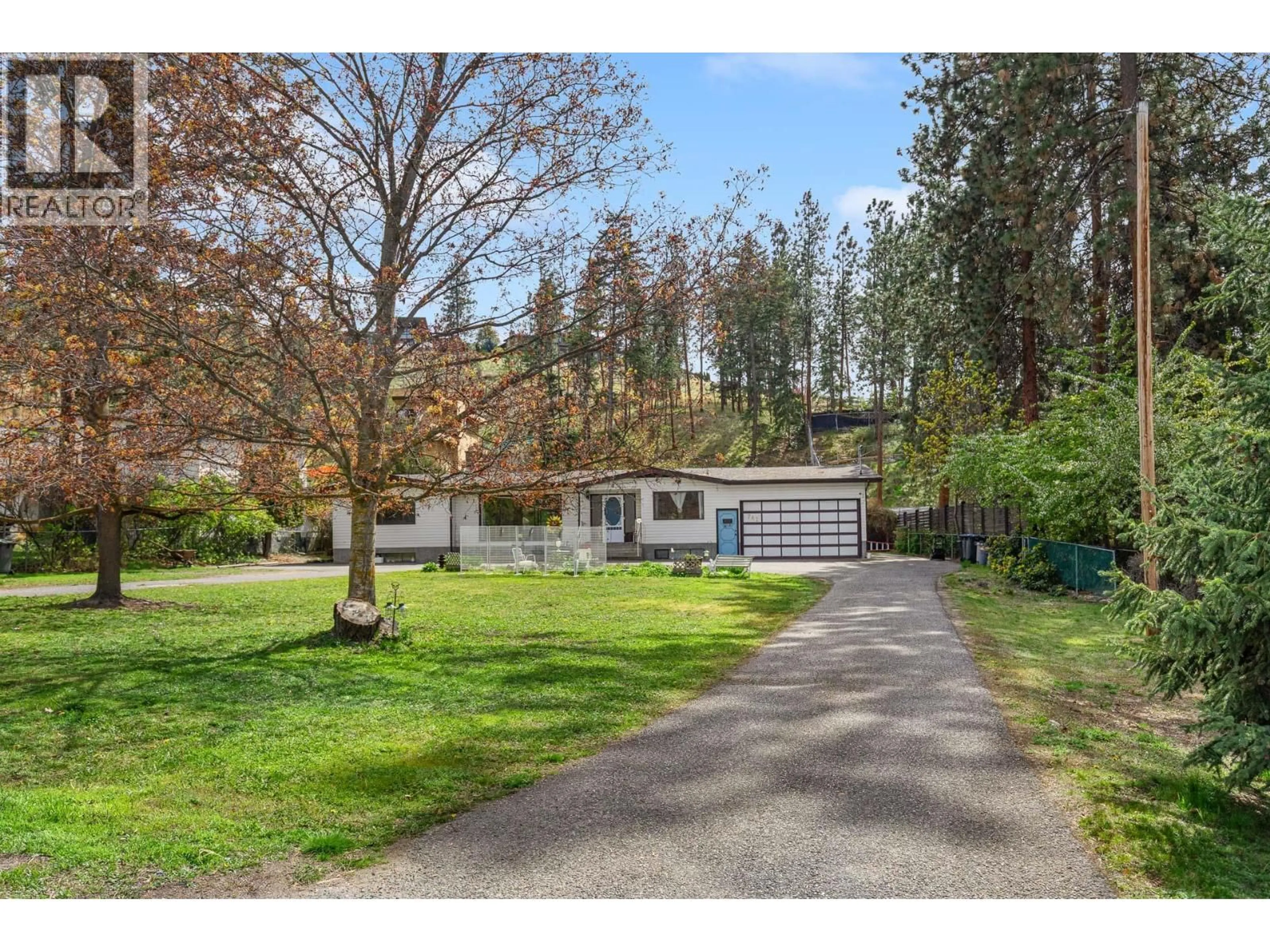 A pic from outside/outdoor area/front of a property/back of a property/a pic from drone, street for 741 BARNABY ROAD, Kelowna British Columbia V1W4N9