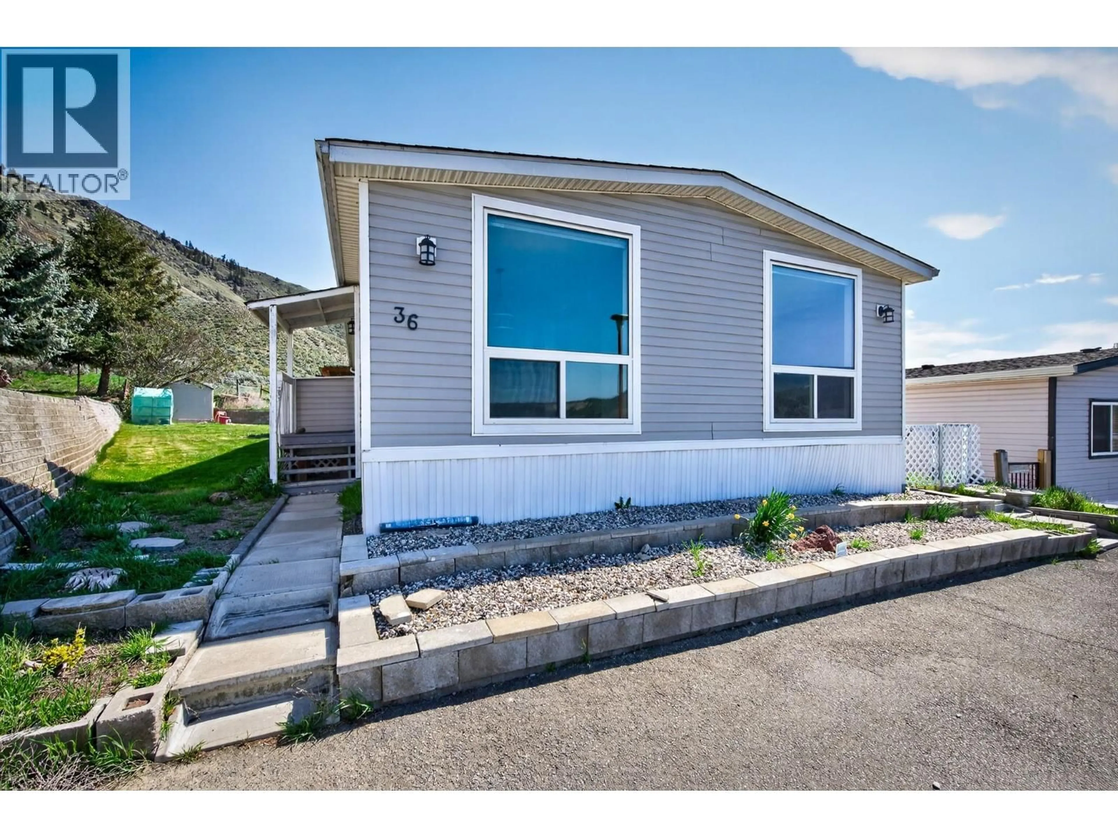 Home with vinyl exterior material, street for 36 - 3099 SHUSWAP ROAD EAST, Kamloops British Columbia V2H1T7