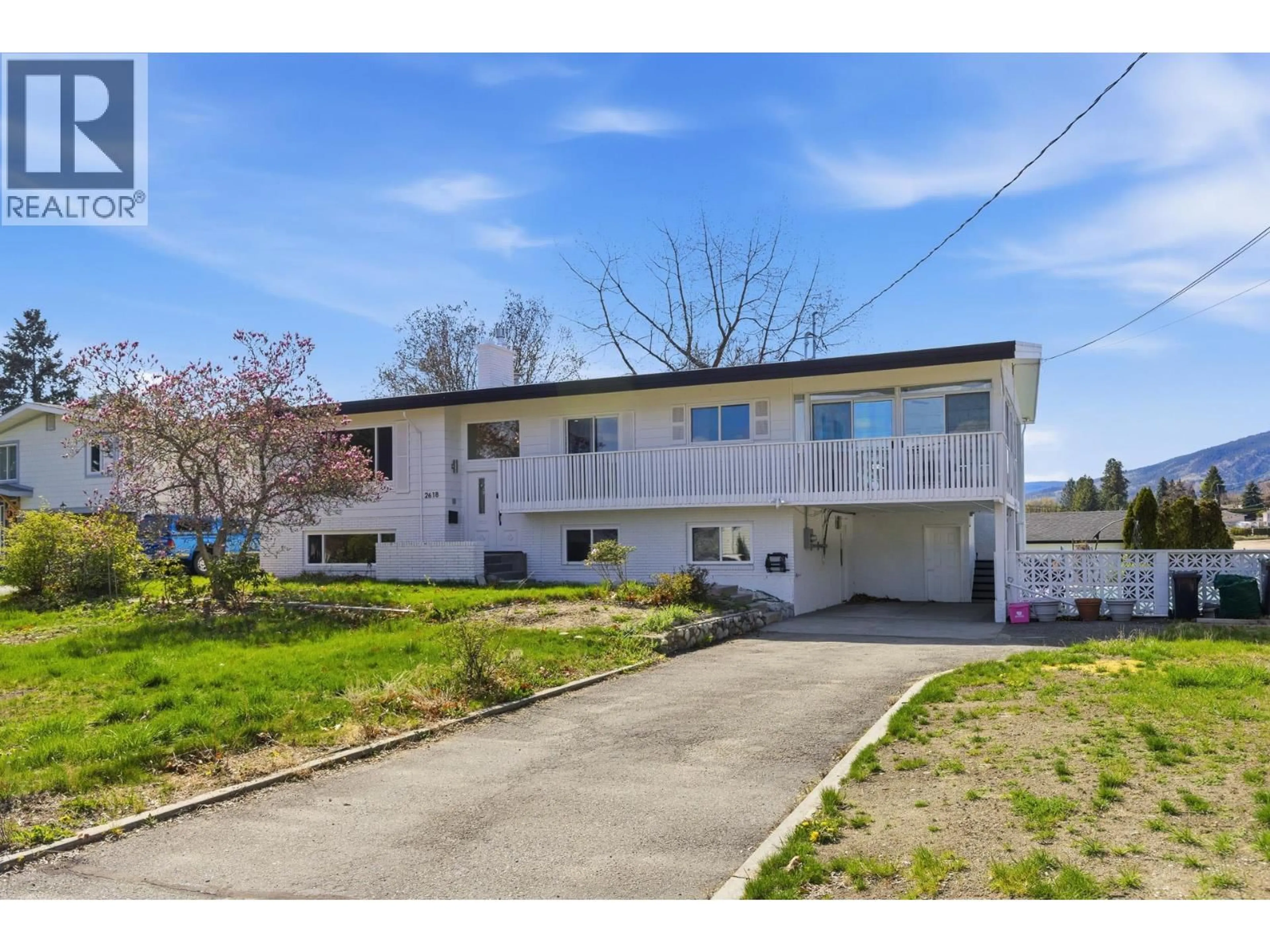 A pic from outside/outdoor area/front of a property/back of a property/a pic from drone, street for 2618 THACKER DRIVE, West Kelowna British Columbia V1Z1W3