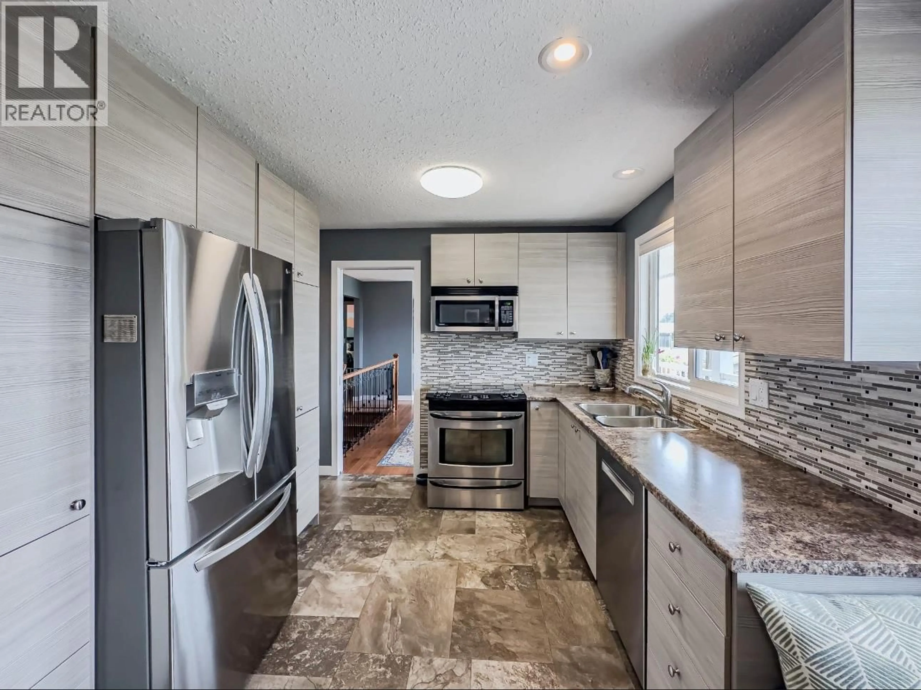 Open concept kitchen, ceramic/tile floor for 1572 MT DUFFERIN DRIVE, Kamloops British Columbia V2E1A2