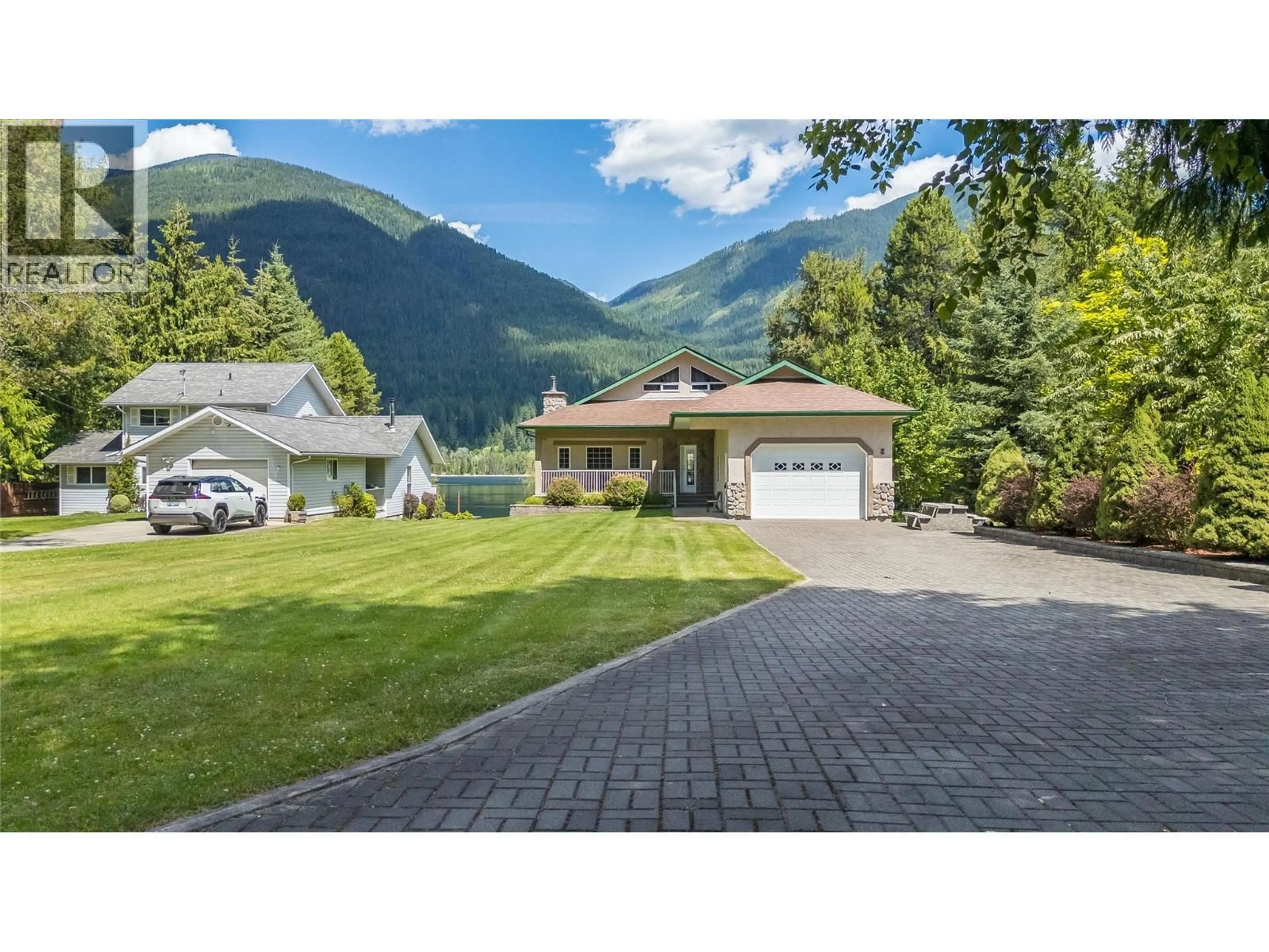 A pic from outside/outdoor area/front of a property/back of a property/a pic from drone, mountain view for 664 AINSLIE ROAD, Harrop British Columbia V1L6P6