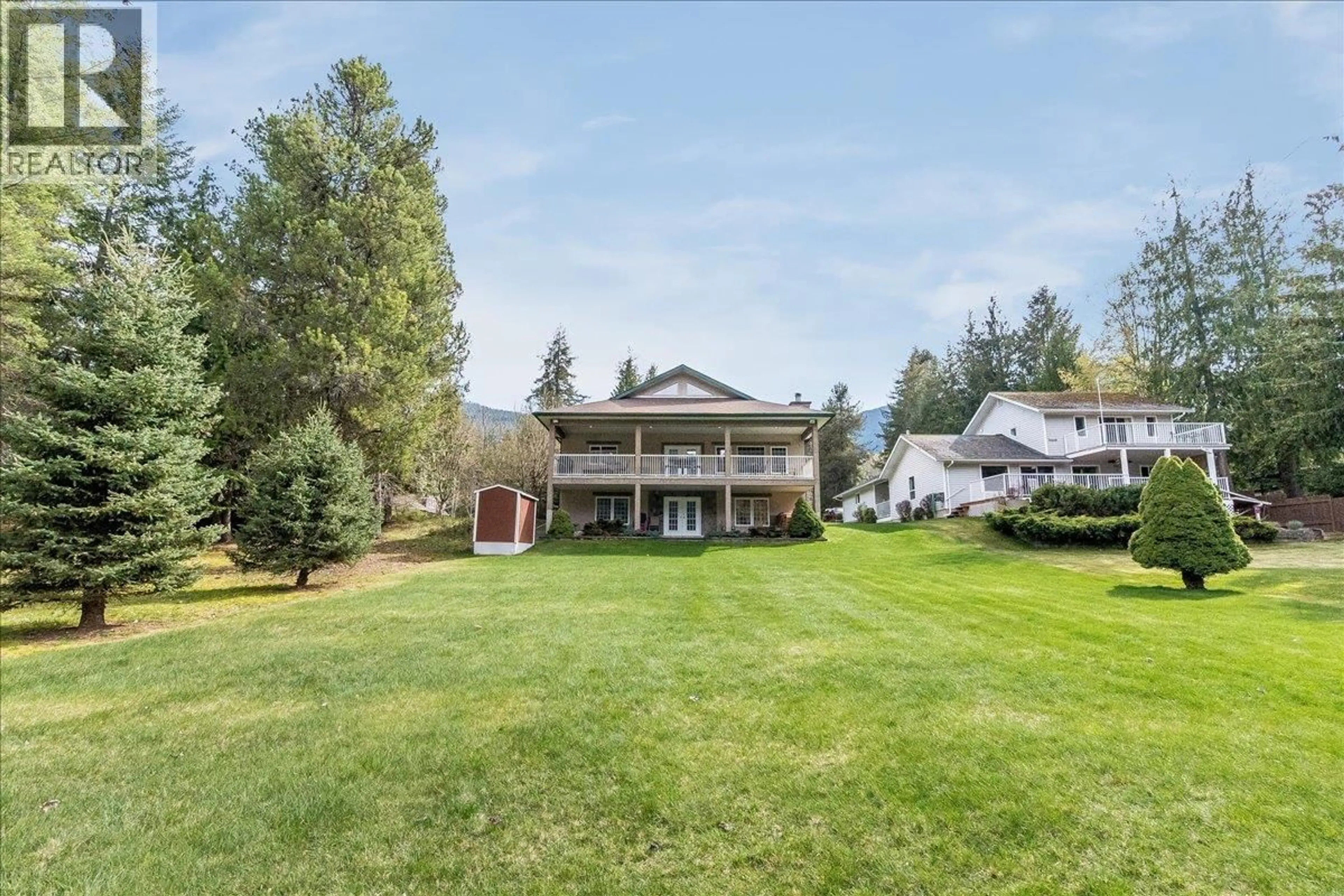 A pic from outside/outdoor area/front of a property/back of a property/a pic from drone, mountain view for 664 AINSLIE ROAD, Harrop British Columbia V1L6P6