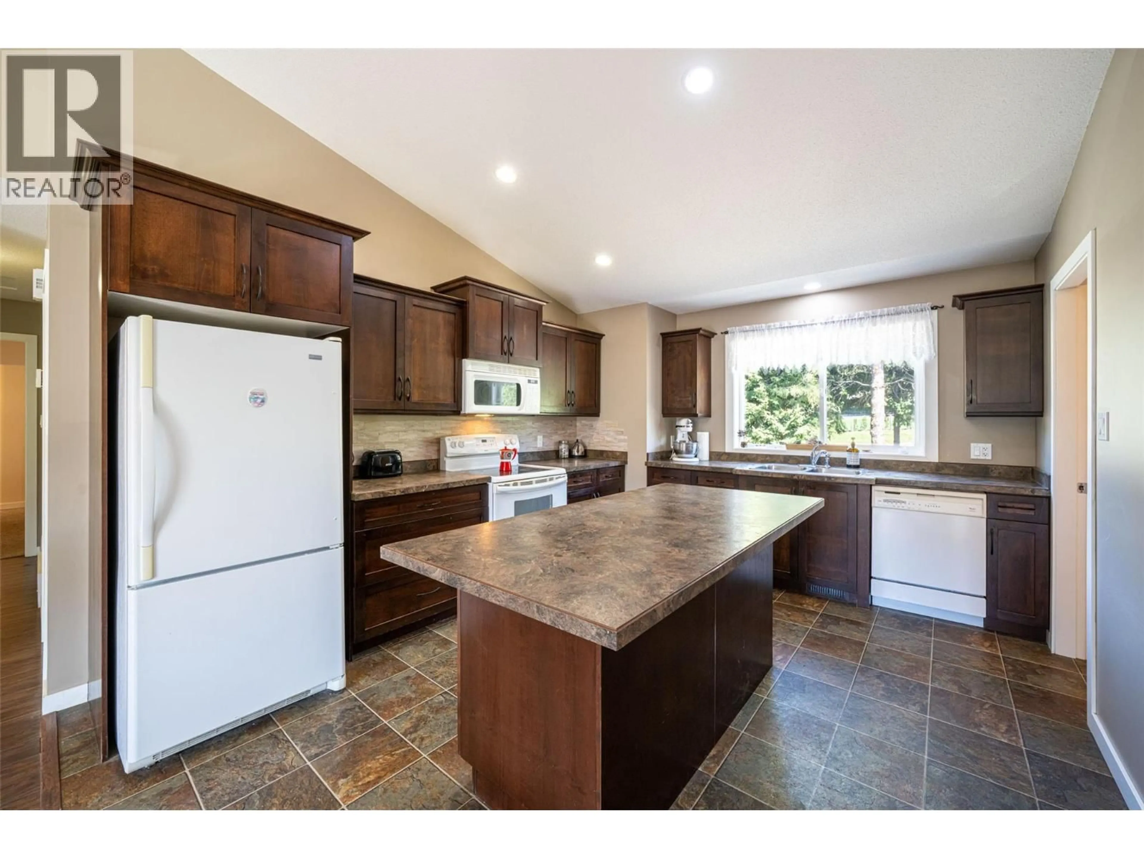 Open concept kitchen, ceramic/tile floor for 5654 LYNES ROAD, Falkland British Columbia V0E1W0