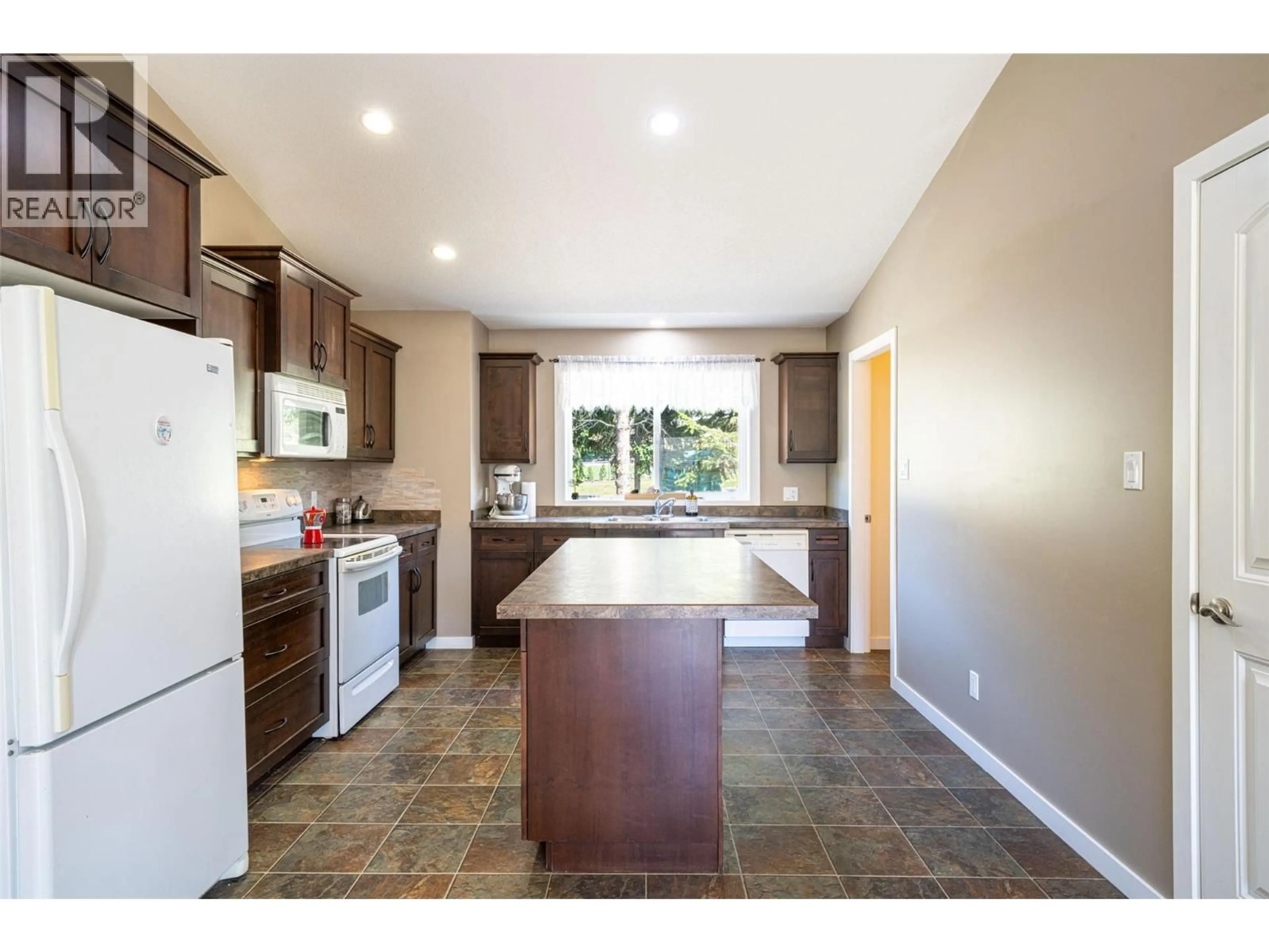 Open concept kitchen, ceramic/tile floor for 5654 LYNES ROAD, Falkland British Columbia V0E1W0