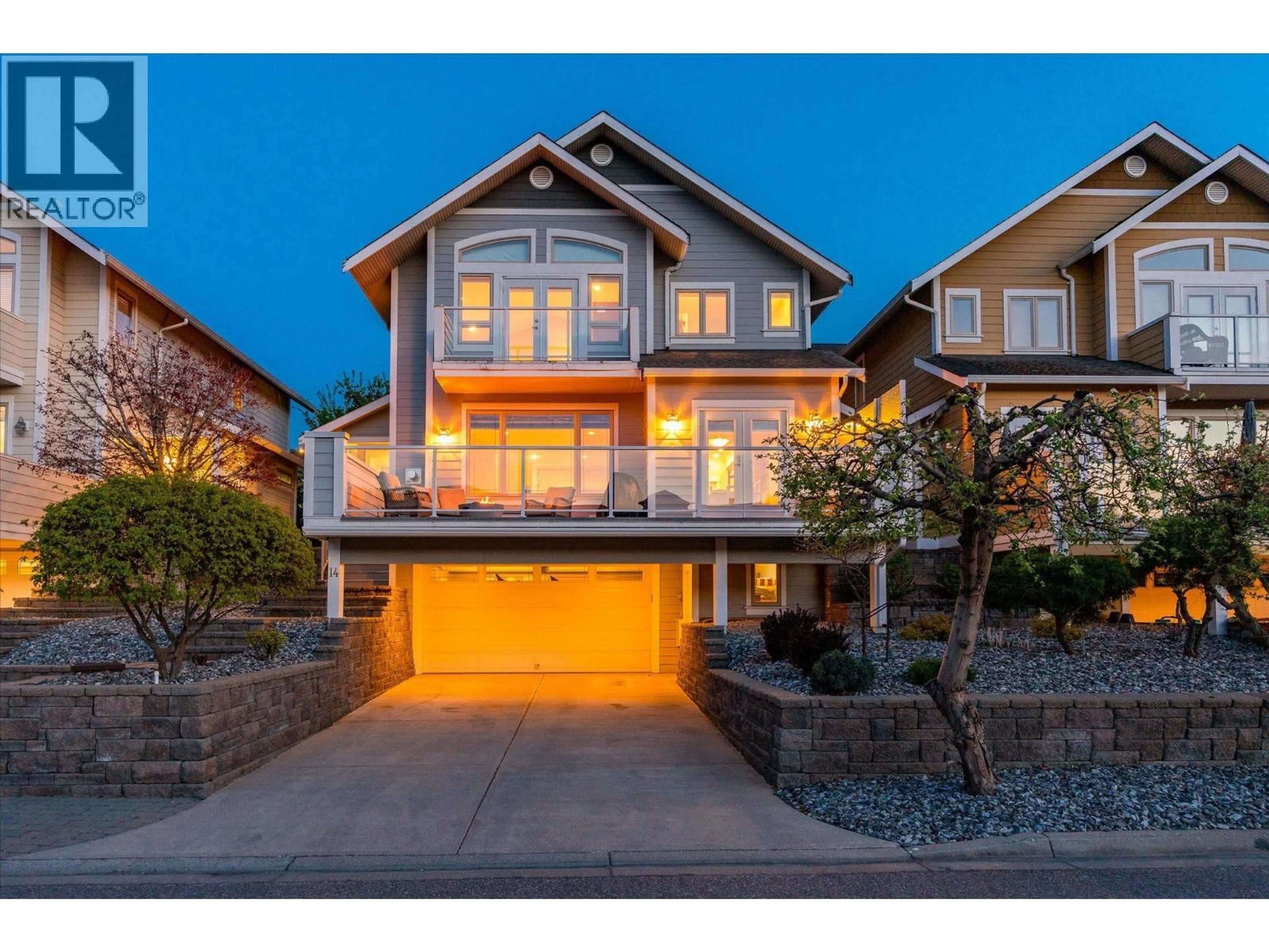 Home with brick exterior material, street for 14 - 7769 OKANAGAN LANDING ROAD, Vernon British Columbia V1T8C3