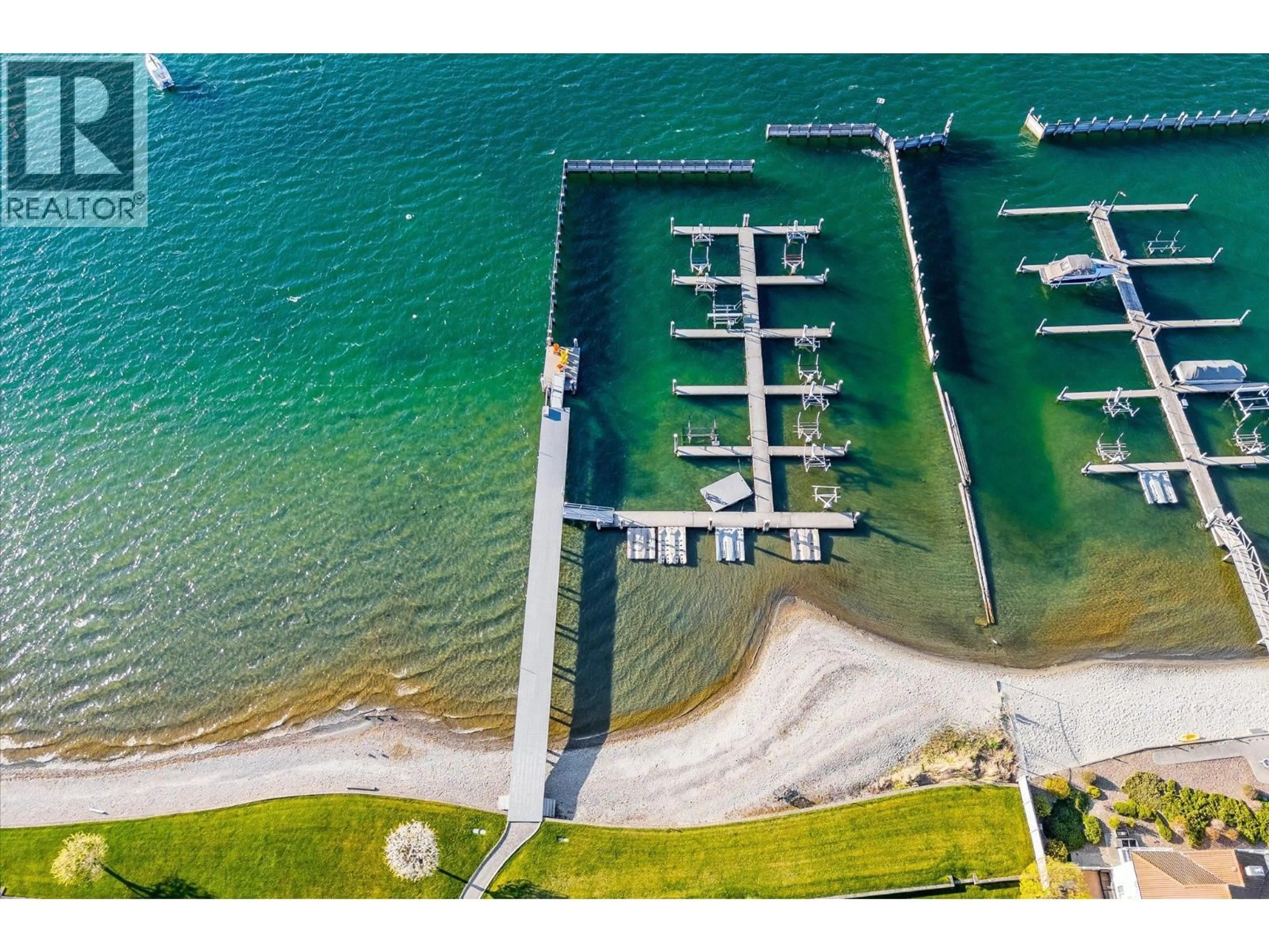 A pic from outside/outdoor area/front of a property/back of a property/a pic from drone, water/lake/river/ocean view for 14 - 7769 OKANAGAN LANDING ROAD, Vernon British Columbia V1T8C3