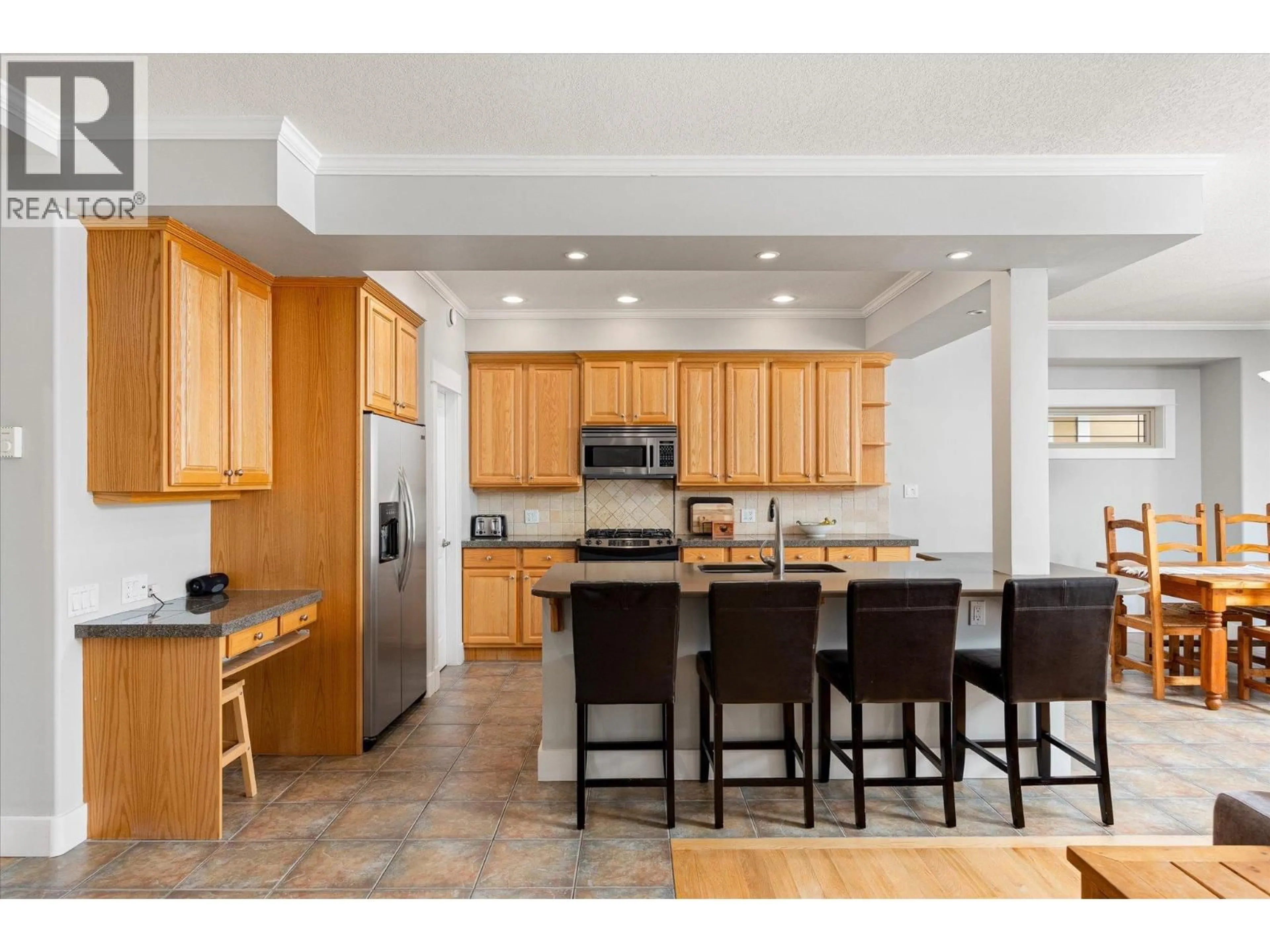Open concept kitchen, ceramic/tile floor for 14 - 7769 OKANAGAN LANDING ROAD, Vernon British Columbia V1T8C3