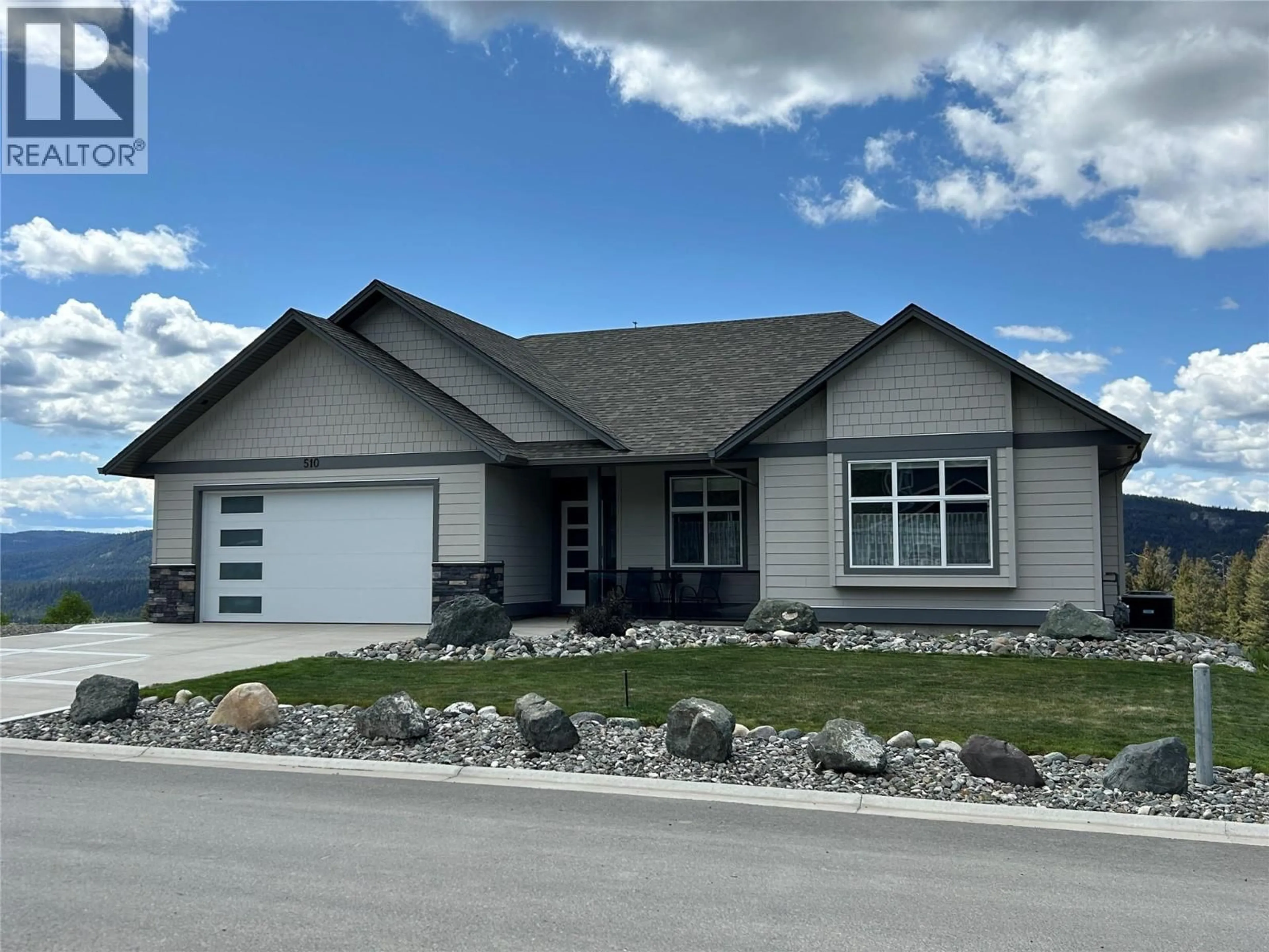 Home with vinyl exterior material, street for 510 POPLAR DRIVE, Logan Lake British Columbia V0K1W0