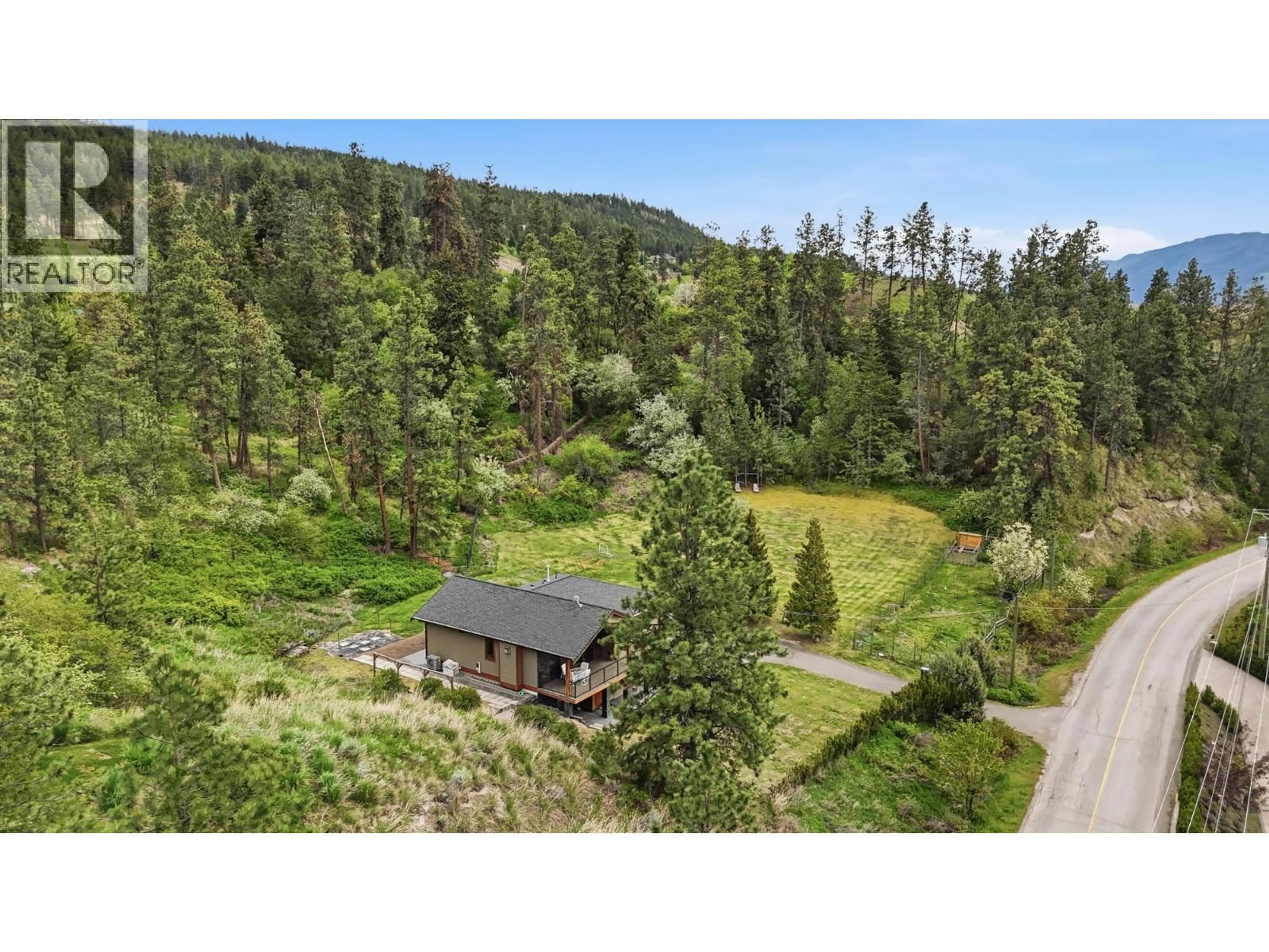 A pic from outside/outdoor area/front of a property/back of a property/a pic from drone, forest/trees view for 16475 CARRS LANDING ROAD, Lake Country British Columbia V4V1C3
