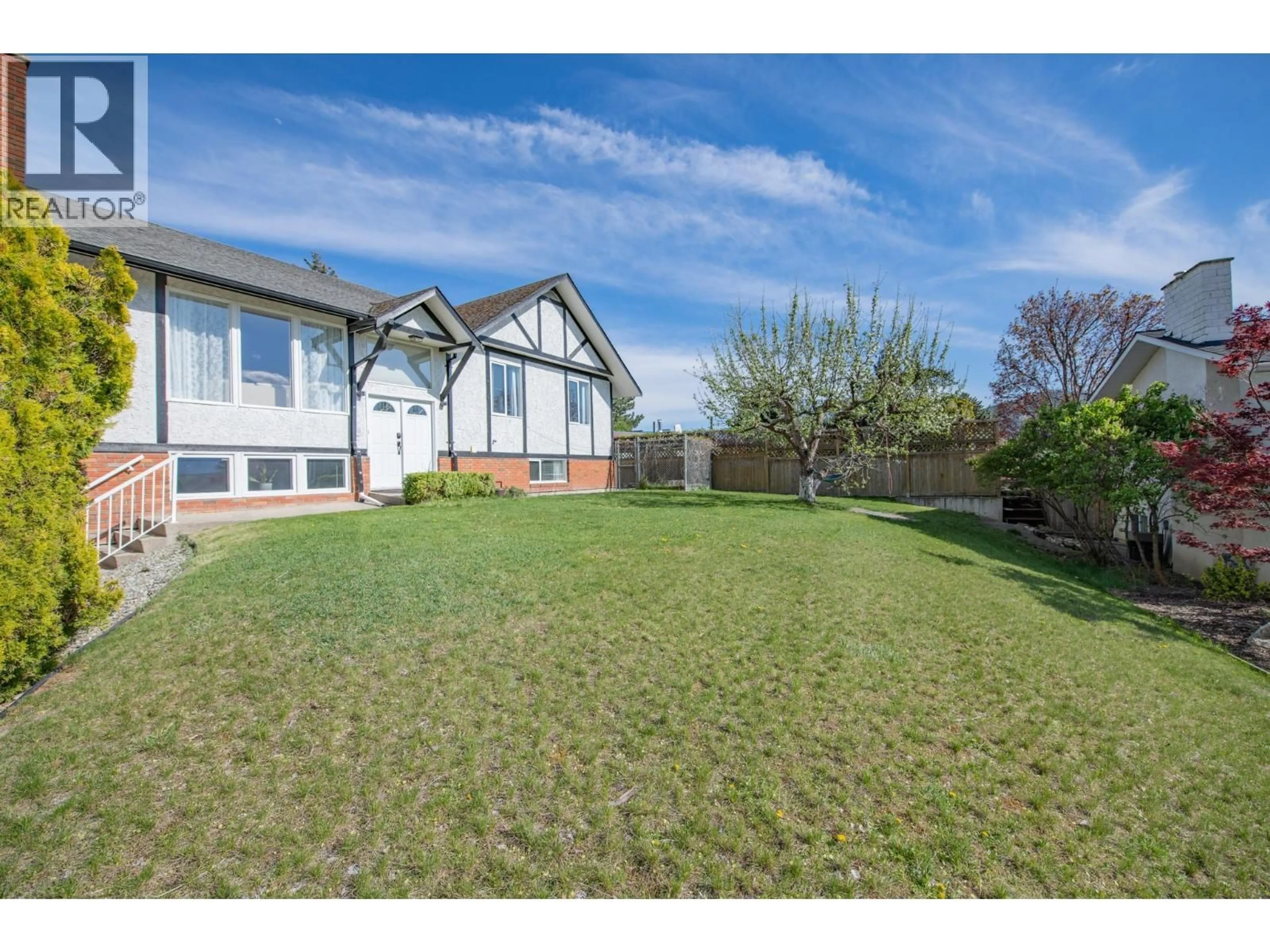 A pic from outside/outdoor area/front of a property/back of a property/a pic from drone, street for 6704 GARNET ROAD, Vernon British Columbia V1H1P1