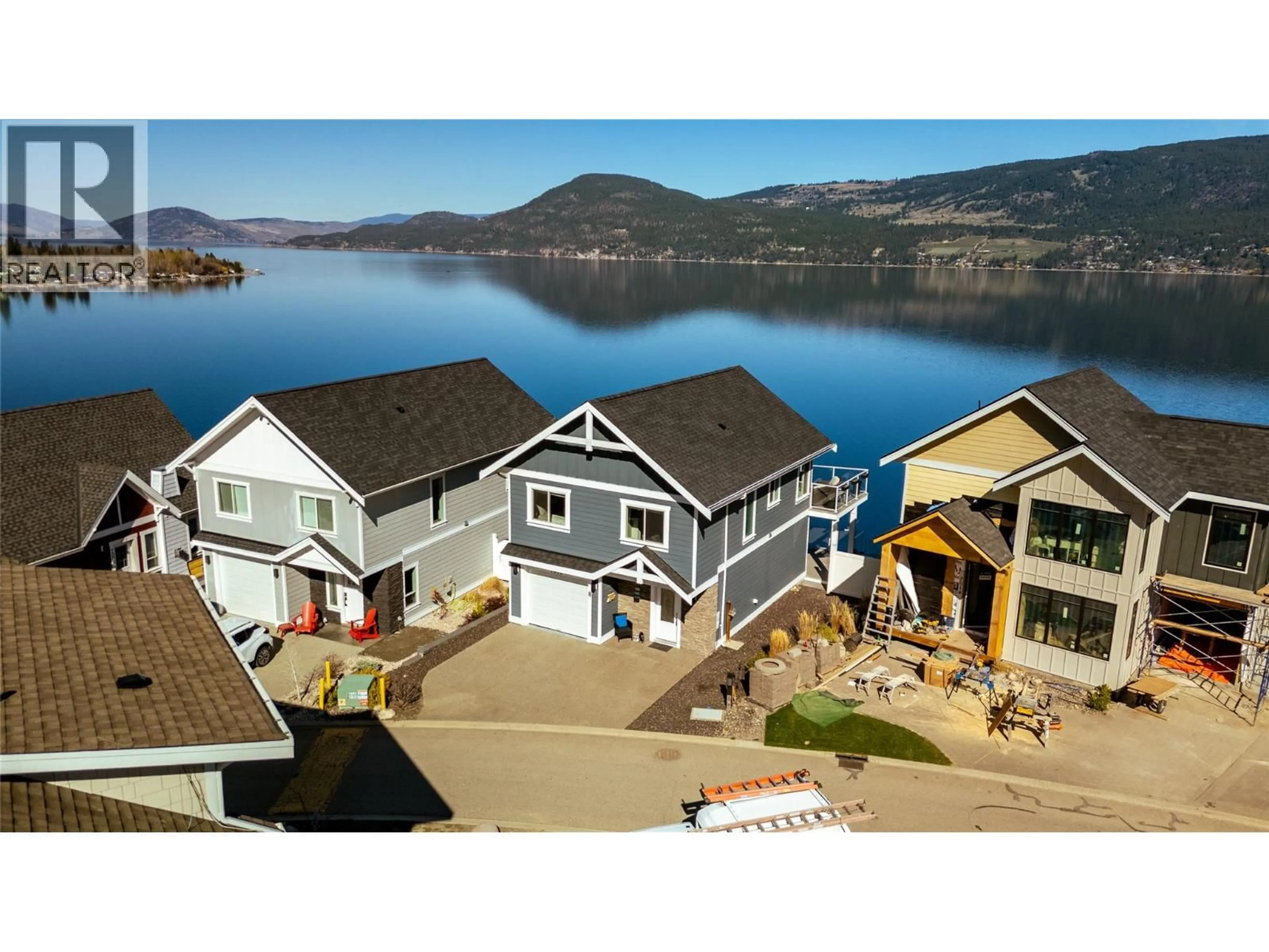 A pic from outside/outdoor area/front of a property/back of a property/a pic from drone, water/lake/river/ocean view for 7012 BARCELONA DRIVE, Kelowna British Columbia v1z3r8
