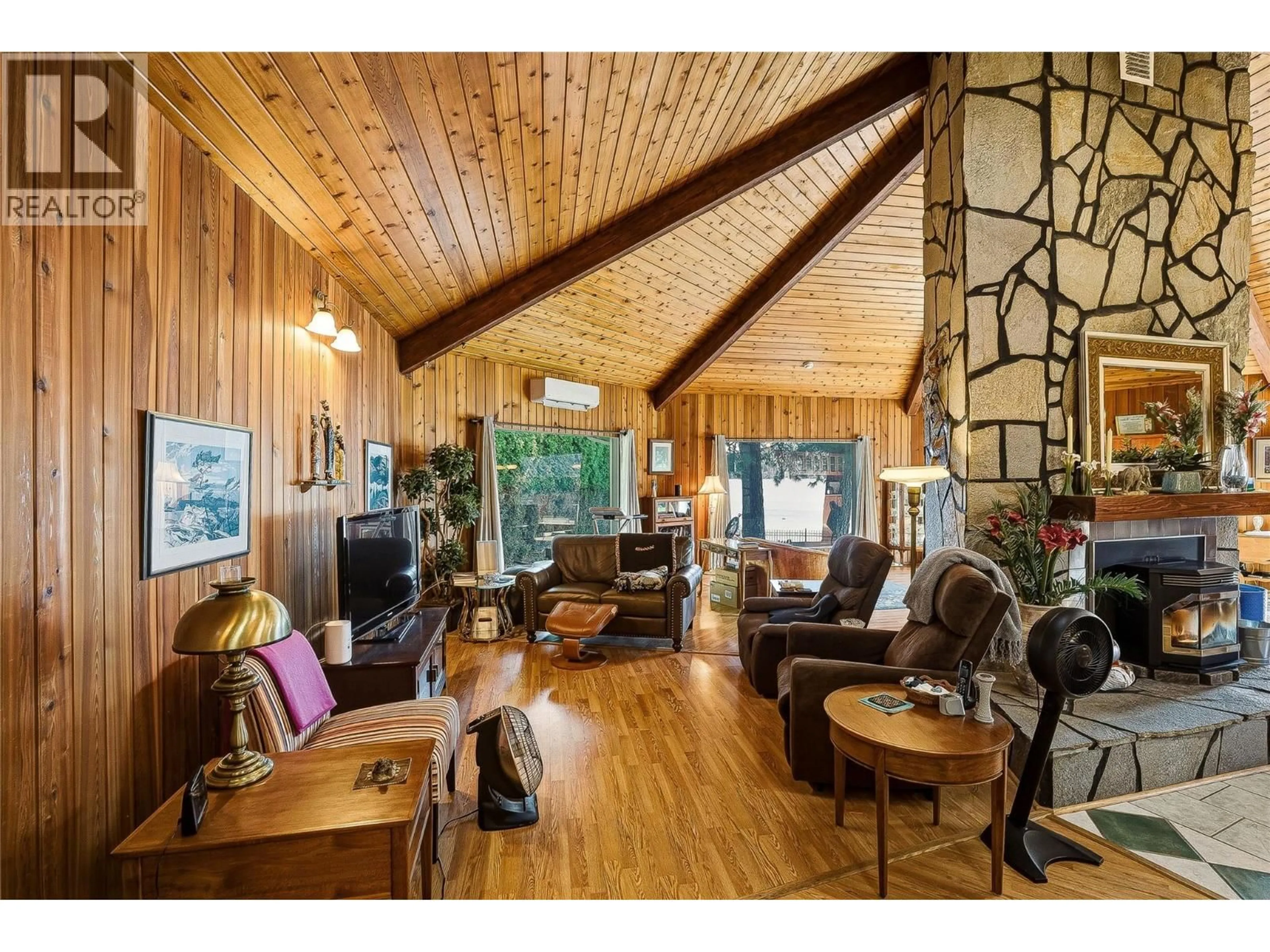 Living room with furniture, wood/laminate floor for DEODAR ROAD, Scotch Creek British Columbia V0E1M5
