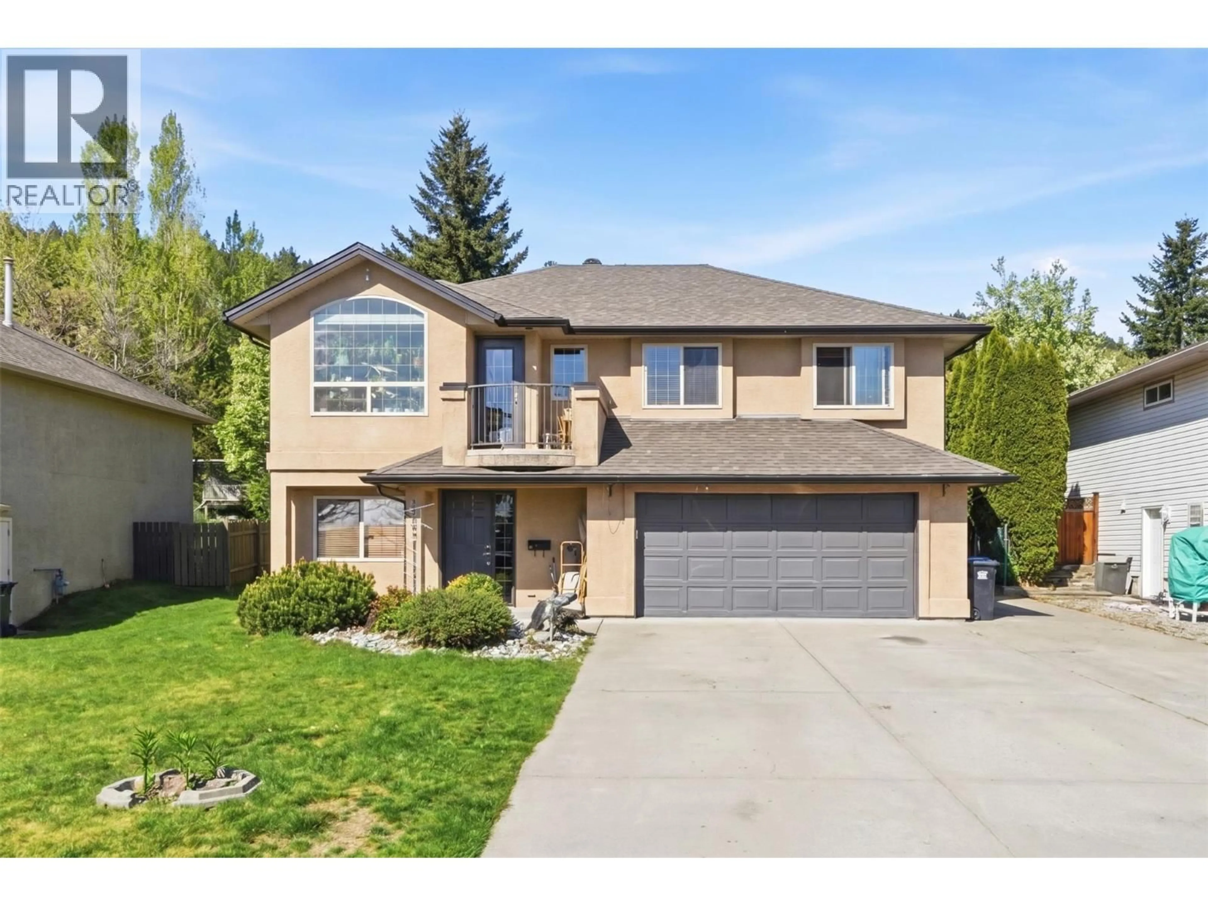 Home with brick exterior material, street for 3528 GLEN EAGLES DRIVE, West Kelowna British Columbia V4T2L6
